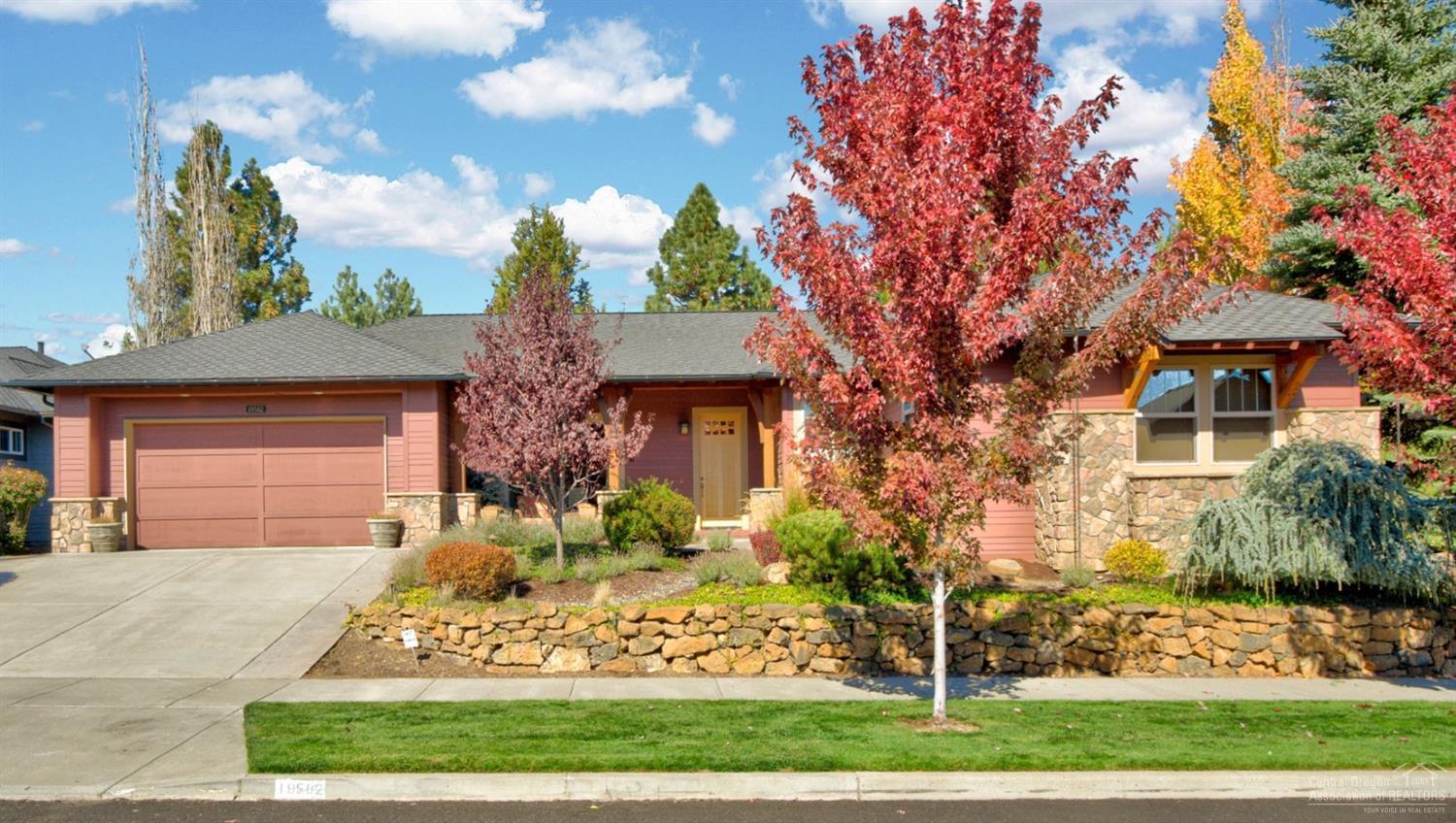 Spacious single level home on the canyon rim in desirable River Canyon Estates neighborhood. Open large lot with back patio seating for entertaining, grass area to watch deer passing through, and a path that leads to your private sitting area to take in the sights and sounds of the Deschutes River below. Master suite with a see through gas fireplace separating bedroom and cozy sitting area. Solid oak hardwood floors in entry and kitchen. Open roomy kitchen with knotty alder cabinets, Stainless Steel Kitchen Aid appliances, island/breakfast bar, and kitchen nook. Large laundry room with ample cabinets for storage. 3 car tandem garage with plenty of room for cars and toys. Home perfectly located 100 yards away from River Canyon Estates Clubhouse, pool, tennis courts and workout room, and just down the street from the neighborhood River Canyon Park with easy access to river trails.