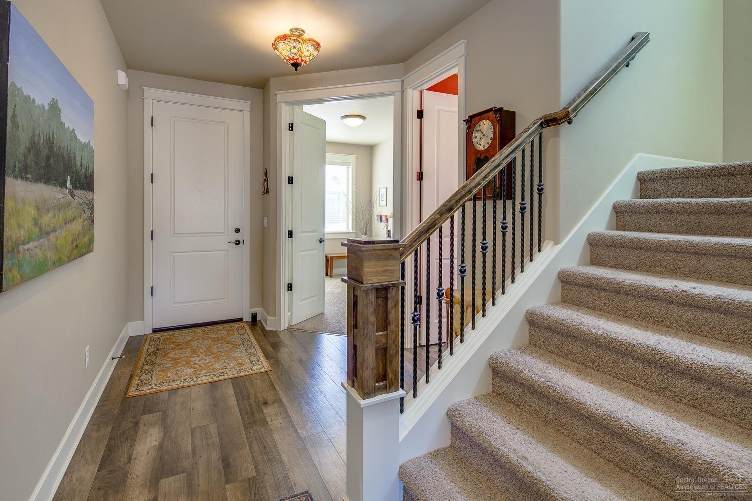 Former Pahlisch Model Home in The Bridges! Ever popular Makenna has an open plan concept for gathering & making memories. Rooms for everyone: 4 Bedrooms, Bonus Room, Main level Office. Upgrades incl:: AC, Control 4 Home System, Radiant Heat Panel, Fireplace w/Blower, Light Fixtures, B/I ironing board. Rave reviews for the walk-in pantry, large master suite w/ tile shower, huge walk-in closet, covered patio. Turn Key = Window Coverings, Refrigerator, Washer/Dryer, Rear yard landscaping. Ready for Summer!