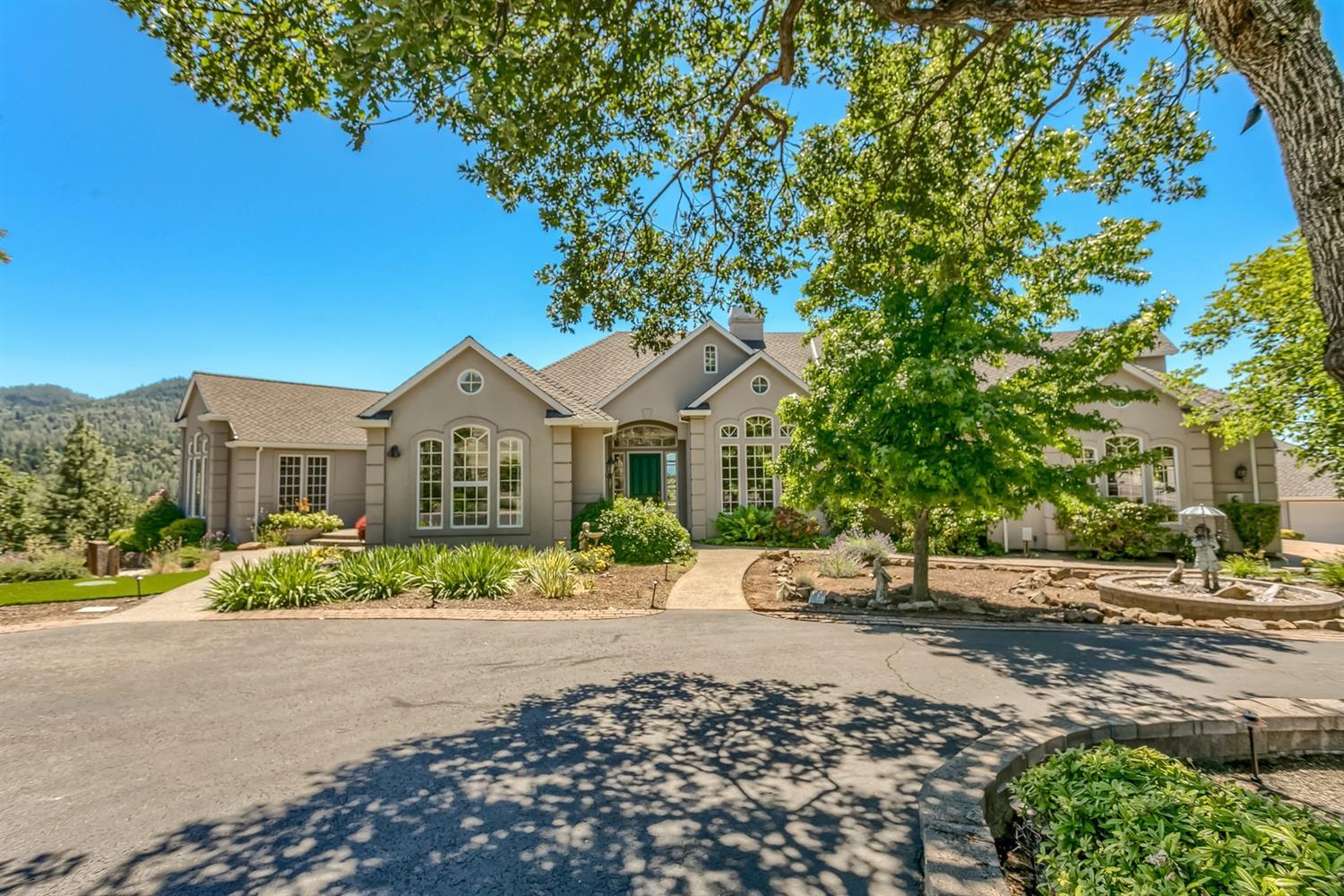 A shining STAR in Sun Ridge Estates this one owner home overlooks mountains, valley lights & all areas of Southern Oregon! Custom designed on 2.1 acres, 10-15 minutes from Medford, this Single Story 5664 sq ft home features expansive, uniquely windowed rooms w/views in all directions, 4 ensuites (or 3 w/mother-in-law qtrs.), office, both formal & informal living & dining rooms, butler's pantry, a kitchen w/island, fine appliances & everything a cook desires, laundry/sewing room, a game or exercise rm, a lg pool w/cover & pool house featuring a sauna, shower, bath & covered outdoor full kitchen. Immaculate and freshly painted. The master suite has his & her vanities and closets, jetted tub, dual shower heads, stackable W & DR & a secret closet w/safe. Attached 3 car gar & freestanding additional 2 car gar, totally fenced & security gated entry, immense patio areas w/stone from India, hot tub, bocce ball court, gazebos w/covers, outdoor fireplace & more. Truly a special property!