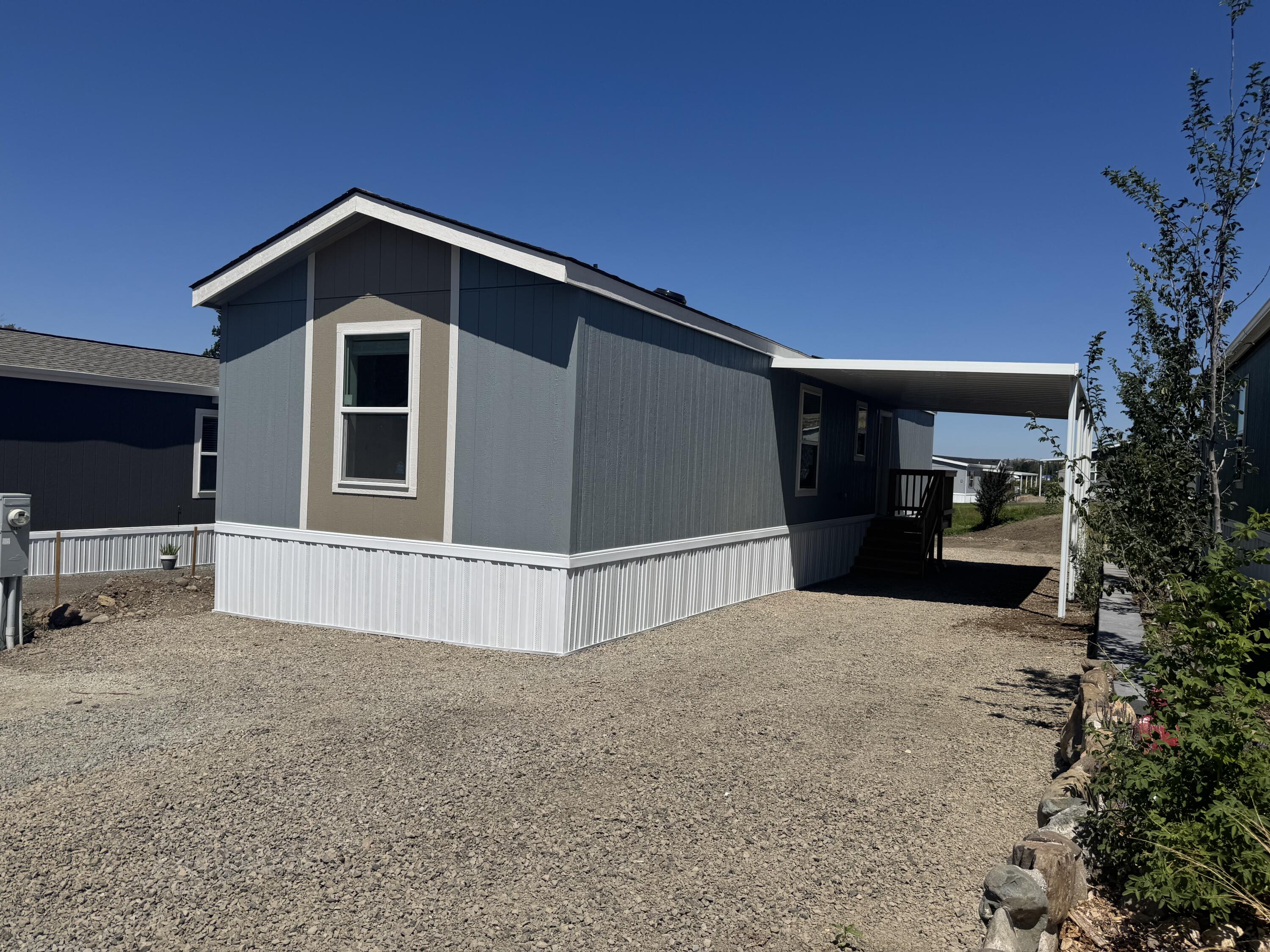 2025 Tempo Series- Still the One- 2beds, 2 Full baths, 840sqft, Samsung Stainless Steel Appliances, Vinyl Flooring throughout, ECOBEE Smart Thermastat, Solar Ready, Homes comes complete with Rheem Hybrid Heat Pump, Carport and Storage Shed!
