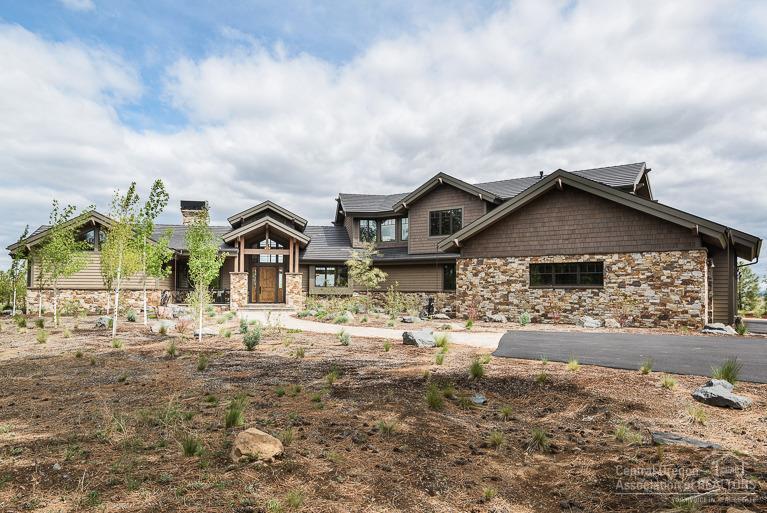 A rare opportunity to acquire 10.02 acres of land within a short bike ride to town in one of Bend's most sought after neighborhoods, The Highlands. Nestled against trees, W/ amazing easterly views this home is 4834 SF large comprised of 4 bedrooms & an office. Built in 2013 & is bright, light & open W/ gorgeous hickory hardwood flrs. Master on main W/ lots of privacy. Chef's kitchen W/ amazing cabinet space, granite slab ctrs, AGA Legacy Range. Grand bonus rm & Ultimate Garage. The perfect home!