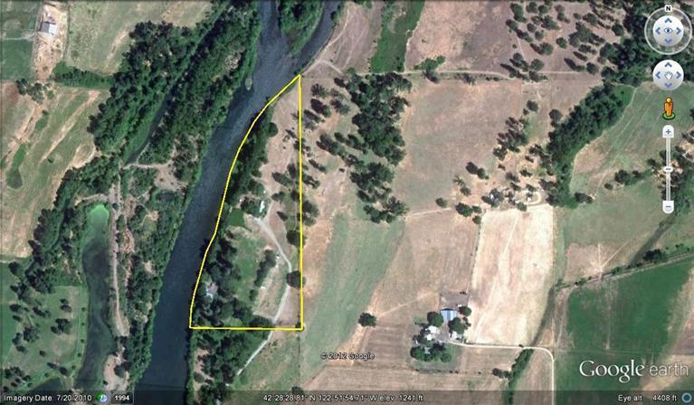 This is a prime piece of Rogue River Frontage. From 1909 until a few years ago this was the elks picnic grounds. There are pre exsisting buildings and trailer spots. With a huge strec of pristine river frontage with access and great fishing. There is a lot of potential on this piece.