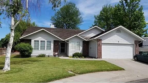 Welcome home to this well kept Gem! All cabinets have solid oak doors & fronts. Solid wood base boards, window & door trim. Elegant tile floor in kitchen/breakfast nook. Plush high grade carpet in living/dining room & master bdrm/bth. Beautiful laminate wood flooring in the foyer & hallway. Elegant (granite look) laminate kitchen counter tops & bthrm vanities w/ tile back splashes. New oversized kitchen sink & porcelain bthrm sinks w/ decorative plumbing fixtures. The large Master bath has a separate shower w/ molded in bench seat, also a large jet tub to sooth sore muscles. Other bdrms & family room have top of the line long lasting commercial grade Berber carpet. New concrete drive for Large RV/trailer w/ full hook ups (sewer, h20 & 30 Amp) A solid well constructed Garden/Tool Shed w/ work benches & a Green house are found in the back yard. Hermiston high school, the fire station and Police Department are just two minutes away. Good Shepherd Medical Center is only 7 minutes away