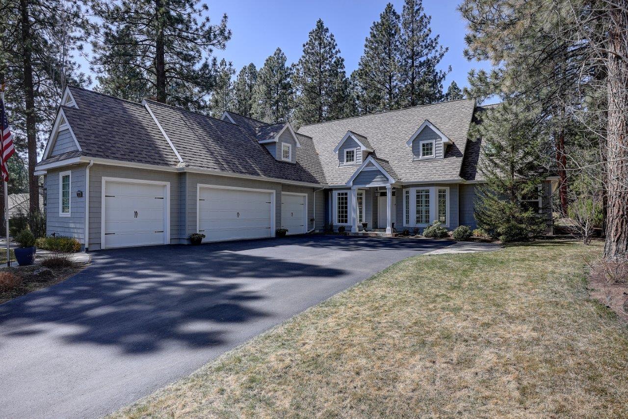 Live your vacation! Fabulous open and inviting home supremely located in a wooded community near Bend's best recreation sites. Windows galore capture the outdoors, Widgi Creek golf course, pond and 7th fairway. Captivating vaulted ceilings, beams, stone fireplace and built-ins bring warmth to the home. Entertainers delight, the kitchen offers space for everyone and views abound. The main floor also boasts a private master suite, office or flex room, half bath, generous laundry and workspace, mudroom. The second floor greets you with a lofty living area and two additional bedroom suites, both with private baths and walk-in closets. There's plenty of in-home storage, as well as 3 bays of garage and a fourth space perfect for golf cart or recreational equipment. So well maintained, all you need to do is move in and enjoy!