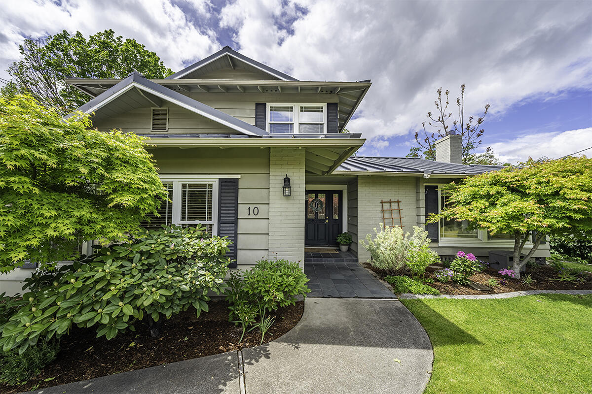 East Medford solid beauty. Graceful & attractive and tucked away on a quiet street. Wide drive leads past the high privacy hedge to the beautifully landscaped front yard with lush lawn & mature plantings.  Fabulous floor plan enhanced with hardwood flooring, crown molding, French doors & beautiful natural light. LR with French doors, fireplace, walls of windows, vaulted ceiling, open beam & open to large dining room with skylights. Separate large family room is a super bonus, all in a circular floor plan with huge chef's kitchen & great room, pantry, 4-person dining bar, granite counters, maple cabinets, gas range, & stainless appliances. ½ bath on this level. Upper-level features primary suite with walk-in & bath w/double sinks, granite counters & tile floors. Bedrooms 2 & 3 plus 2nd full bath. Overly spacious 2 car garage w/3 storage rooms. The fully fenced rear yard is private w/expansive lawn areas & large entertaining patio. This home is a true gem.  New HVAC being installed.