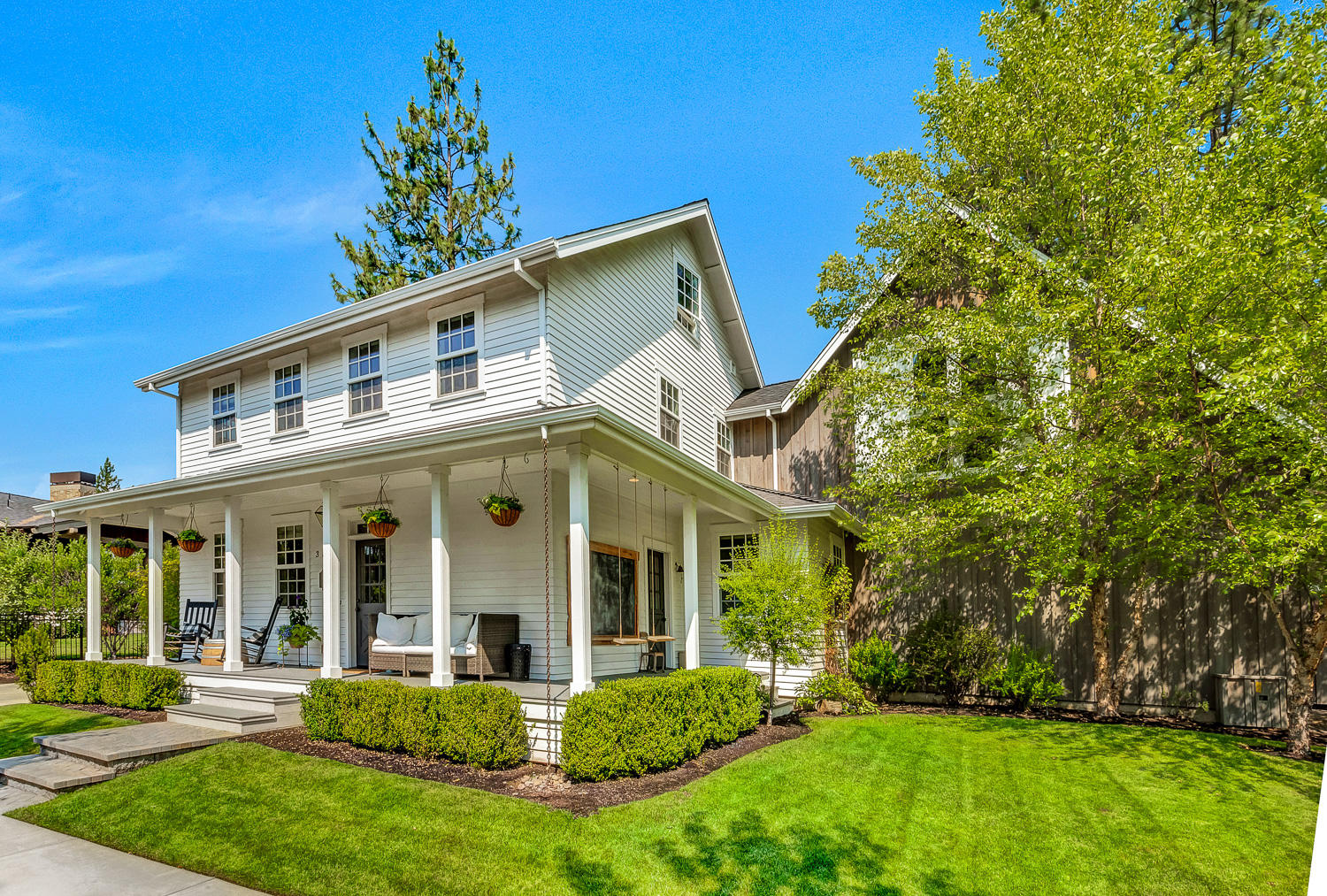 This Westside Oasis is the perfect blend of vintage farmhouse charm & thoughtful, modern design. Classic wraparound porch pulls you into a generous main living area designed for entertaining, accented by wide-plank hardwood floors, white wood-clad ceilings & double French doors to the private courtyard.  A masterfully designed kitchen is anchored by an oversized island & filled with custom cabinetry, 6 burner AGE Legacy range & double pantry.  Adjacent flex room is ideal for schooling or socializing w/direct courtyard access. Upstairs, the primary retreat includes an infrared sauna, clawfoot tub, marble shower and a custom walk-in closet. The ''bunkroom'' boasts a second living area, 2 bedrooms & loft. Enjoy your own personal park on this 3/4 acre lot, complete with a stand alone 540sqft cottage, ideal for friends & family. Add to all of this, there is also a unique development opportunity with the potential to create up to an additional, 3 city lots. This opportunity can't be missed!
