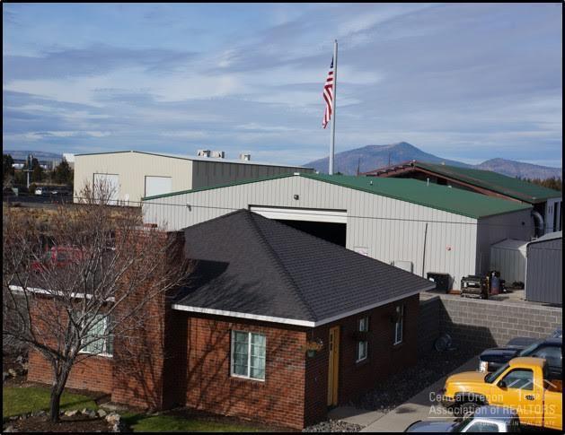 Three buildings on 5.51 acres. Fenced yard. Office - 1100sf, older warehouse - 8800sf, new warehouse with covered drive thru - 14,000sf. 480v/600a power. Each bldg has ADA restrooms. Multiple rollup doors, insulated with gas heat, cement floors, gravel outside storage yard, paved parking lot. All buildings in excellent condition. Tenant has a lucrative, three year NNN lease with income generating excellent cap rate.