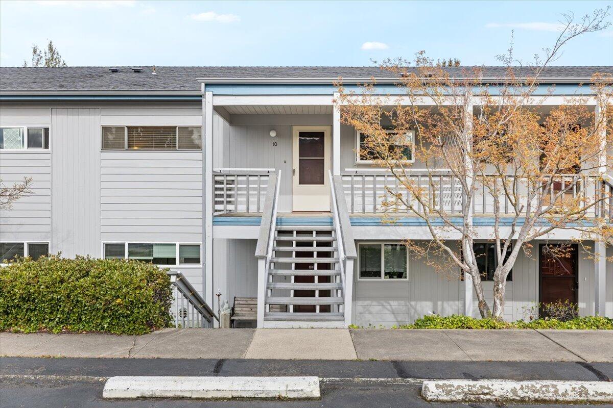 Quiet Upstairs Condo with spectacular views. Oak Knoll Golf course is right around the corner. Remodeled with beautiful new Hickory Style Flooring, all new stainless steel kitchen appliances, waterfall sink, butcher block countertops, and garden window. The bathroom is updated with double sinks, walk-in shower and newer washer and dryer. Water heater is also new. Off of the private 200 sq. ft. balcony is a storage area with workbench, pegboard, shelves and power_ The covered carport has additional storage cabinets. HOA covers water, sewer, garbage, landscaping and all exterior maintenance. All new plumbing and exterior paint just completed, and there are community raised garden beds for you to enjoy. Don't miss this rare opportunity to own an incredible condo close to shopping and recreational activities in a desired neighborhood.