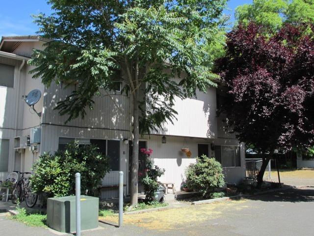 Wonderful investment opportunity in downtown Grants Pass. 15 unit apartment complex on 0.49 acre lot and 2 bedroom, 1 bath home on adjacent 0.17 acre lot with additional parking for tenants. Four units were completely rebuilt and completed in April 2013 due to tenant fire. Buildings were painted in 2013, Trex balconies and stairs rebuilt in 2009. All decks have been replaced as well as the walking bridge.100% occupancy with increasing rents opportunity. Both tax lots to be sold together. Ideal for a 1031 Exchange Property. All information is deemed reliable but not verified; anyone considering purchasing this property should perform their own investigation into the uses and condition of the property.