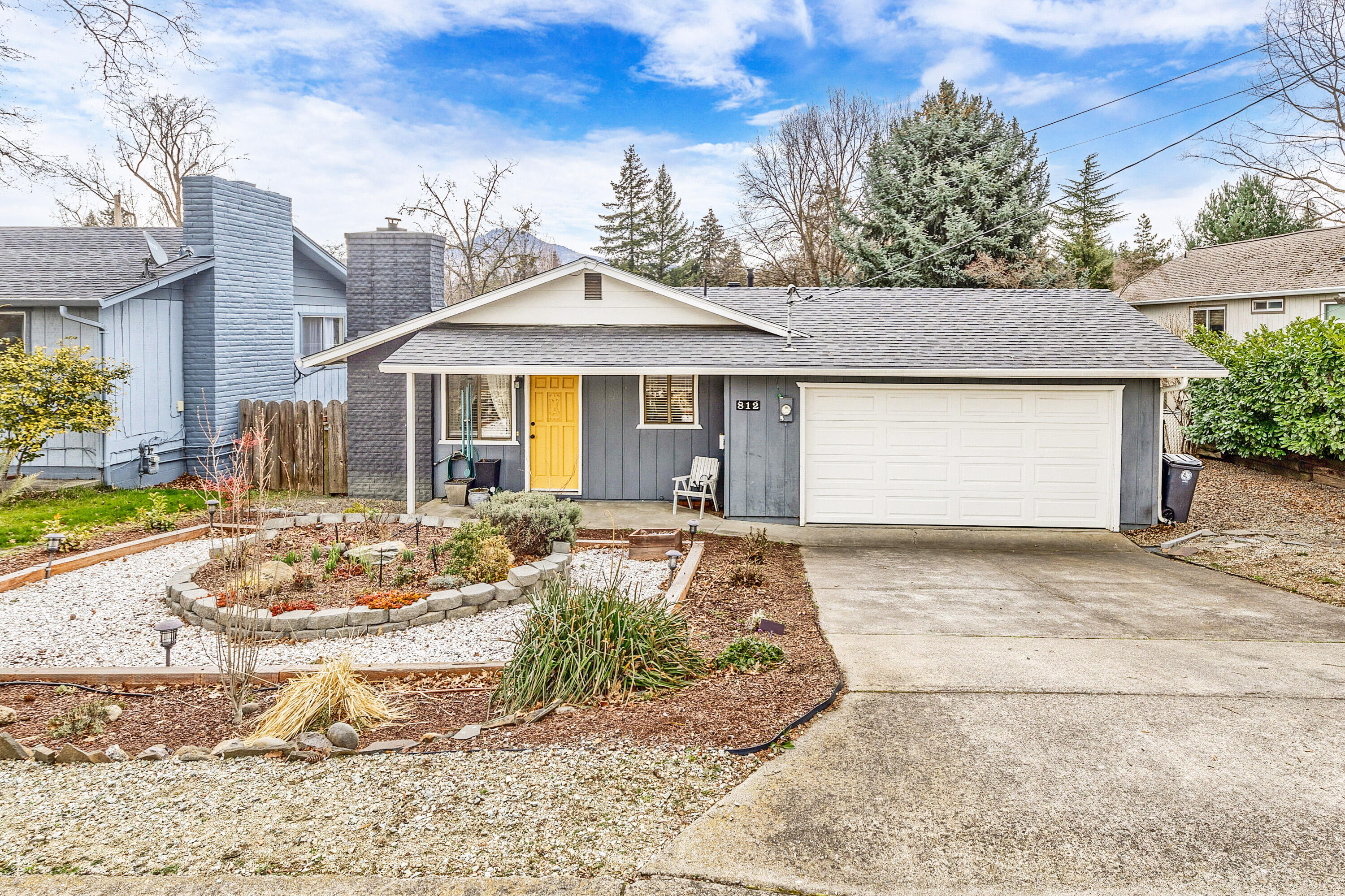 Well maintained, single level home in a well established E Medford neighborhood. Stylish and durable laminate flooring throughout the primary living areas, dining and bedrooms. Galley kitchen features granite countertops, subway tile backsplash and a breakfast bar. Light filled living room has a cozy, certified woodstove with rock surround. Owners suite is nicely separated from the other two bedrooms, has a tiled bathroom and direct access to the rear deck and back and sideyards. Two car attached garage, small RV Parking. There are raised garden beds in the back, room for outdoor entertaining and good privacy. Newer roof and paint. Electrical panel, plumbing and sewer line were all replaced in the last few years. One owner is licensed Broker in the state of Oregon.