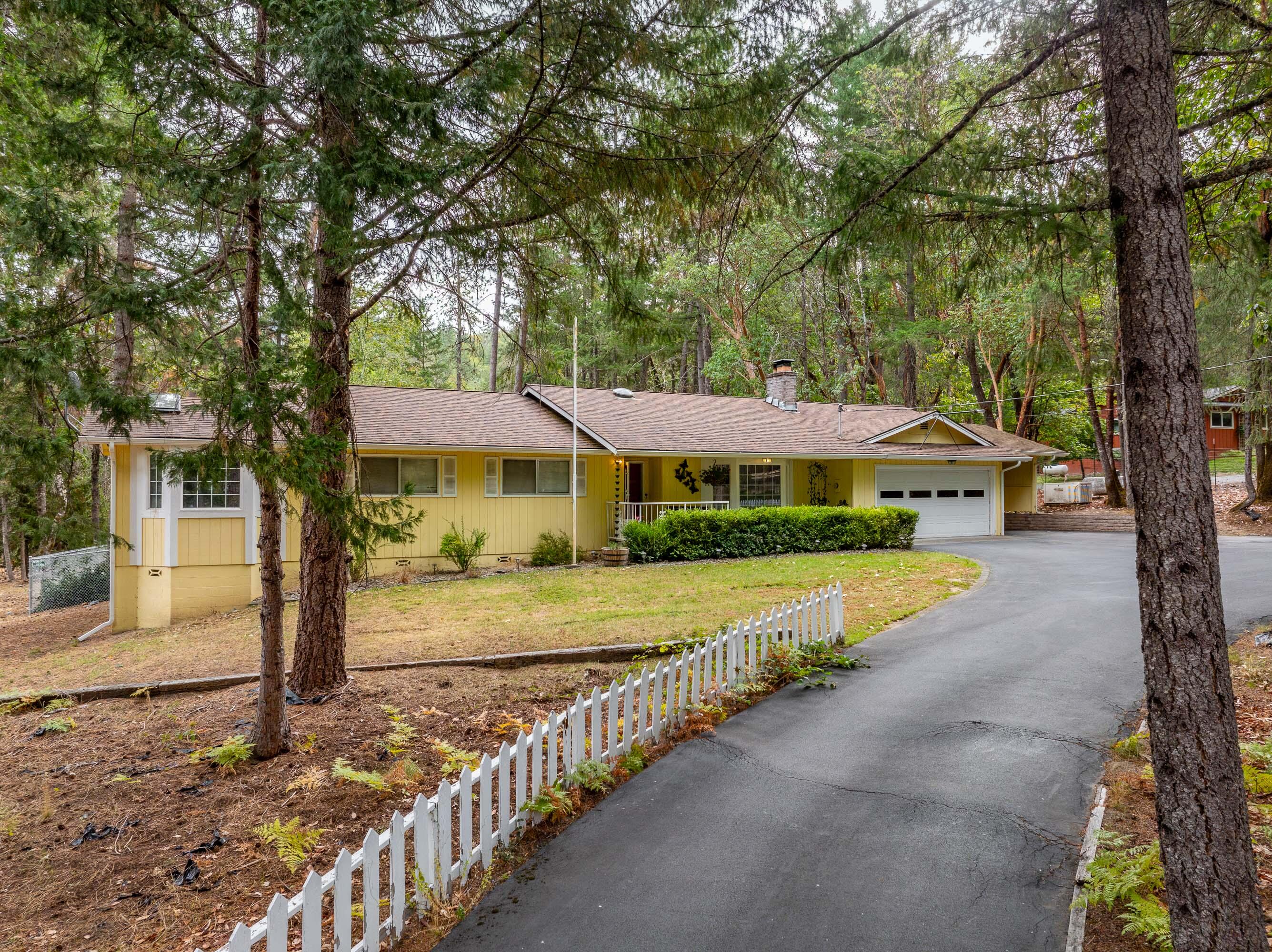 This 4 bedroom/4 bathroom home is set on 1.13 acres that is just the right amount of rural living. Offering a combination of space, comfort and flexibility, this home is designed to meet your needs with the beautifully updated chef's kitchen, featuring a double oven, gas oven-range, oversized kitchen island, an abundant amount of counter and rustic hickory cabinet space. Whether you love to cook or entertain, this kitchen with two dining areas will provide plenty of room for hosting gatherings and flows seamlessly into the living spaces. This home's design includes a separate living quarters, perfect for multigenerational living space or even a rental opportunity to generate income, big bay windows, sun tubes and skylights throughout the home that provides natural light. This home is equipped with a Generac generator, ready to kick on should you lose power. The property is spacious, level, fully fenced and has so much to offer! Call to see this home today!