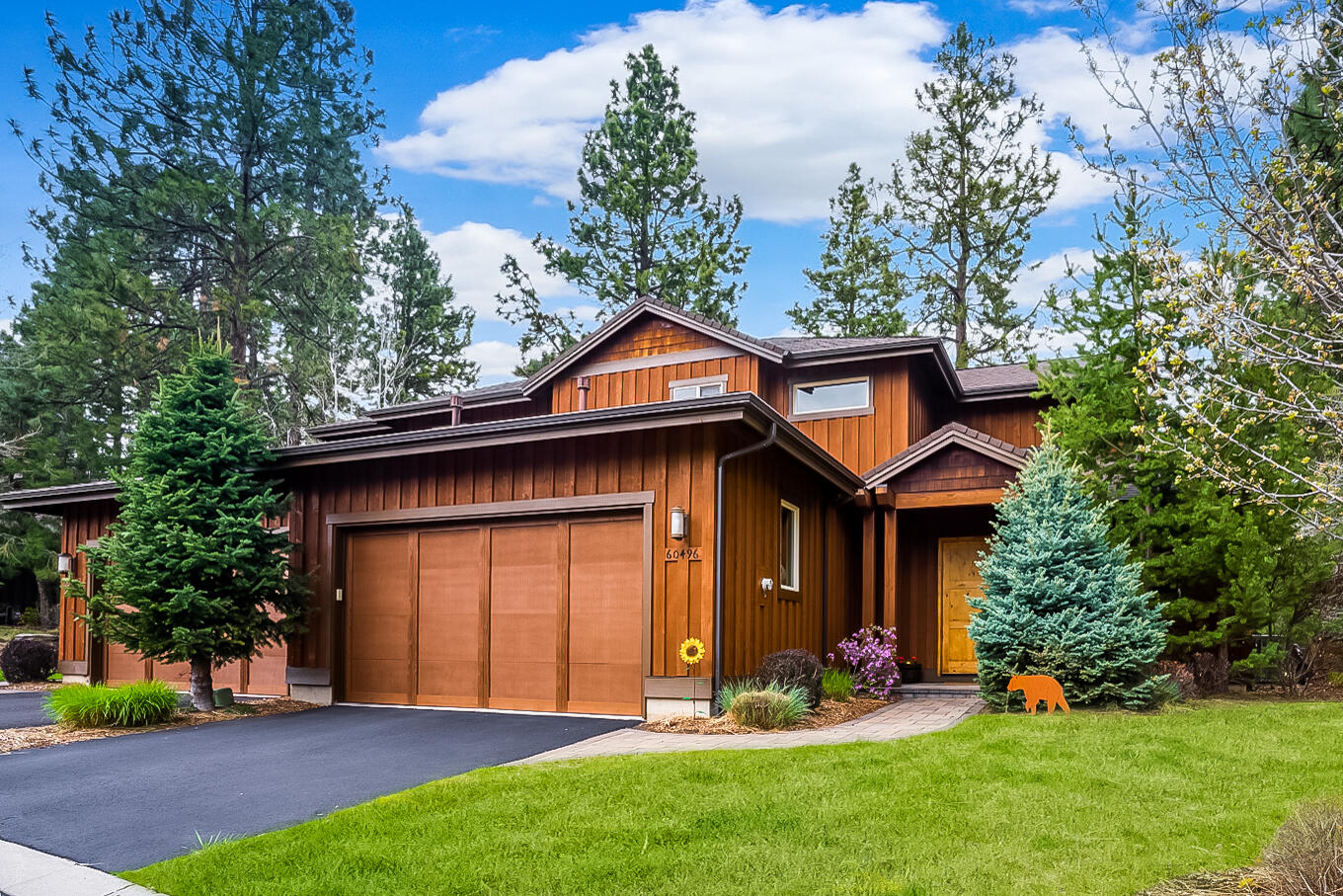 This great find in coveted Points West is a perfect winter retreat or year-round residence. The closest neighborhood to Mt Bachelor combined w/a premium location on the 16th fairway of Bends premier public golf course in a gated community offering  privacy & peaceful quiet adjacent to the Deschutes River. The residence is truly made for both entertaining, adventure & everyday living w/plenty of indoor & outdoor spaces. Enjoy the high ceilings, chef's kitchen w/arge pantry, 3 en-suite bedrooms including a primary on the main level with its own fireplace and door to patio. The heart of this home, the kitchen, adjoins dining, family & outdoor spaces. Welcome guests on the large patio bordered by your own Bocce Ball court. Enjoy storing wine in the secret wine closet, the dedicated office, walking the river trails accessed close by, fly fishing and riding fresh powder. in the winter, This townhome is well cared for and ready for new owners. HOA covers all landscaping front and back & more