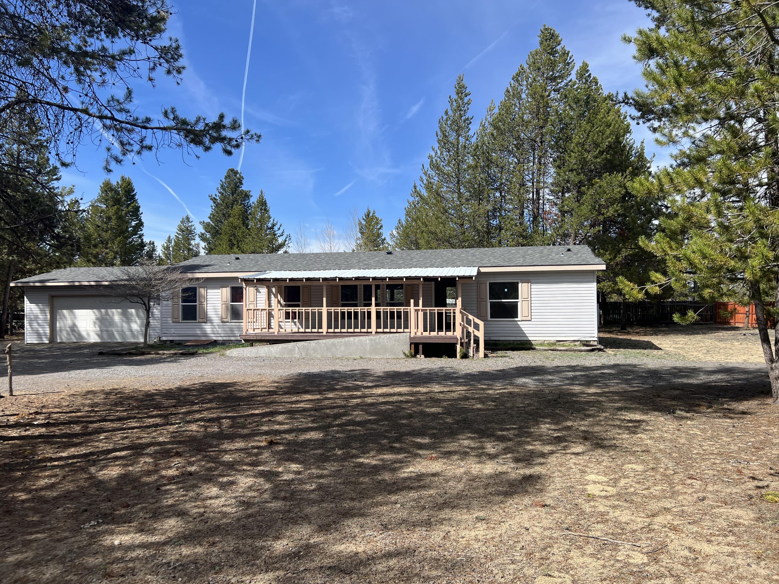 COMMERCIAL PROPERTY:THIS PROPERTY INCLUDES TWO PARCELS OF COMMERCIAL REAL ESTATE. ONE PARCEL IS ON THE SOUTH SIDE OF WILLIAM FOSS RD, THE ADDITIONAL PARCEL IS LOCATED DIRECTLY ADJACENT ON THE NORTH SIDE OF WILLIAM FOSS RD. THE NORTH PARCEL INCLUDES A 2000, DOUBLE WIDE MANUFACTURED HOME ON 1.23 ACRES. HOME IS 3 BEDRM, 2 BATH WITH AN OFFICE AREA. A NEWER ROOF AND HEATING SYSTEM.  INTERIOR SQUARE FOOTAGE IS APPROXIMATE 1539 SQ. FT. THERE IS AN ATTACHED GARAGE, AND A DETACHED METAL SHOP TO THE REAR OF HOME. OPPORTUNITY FOR A HOME BASE BUSINESS AND OR A NEW COMMERCIAL BUILD ON ADDITIONAL VACANT PARCEL. BUYER TO, DUE DILIGENCE WITH CITY TO VERIFY INTENDED USE. A MUST SEE!