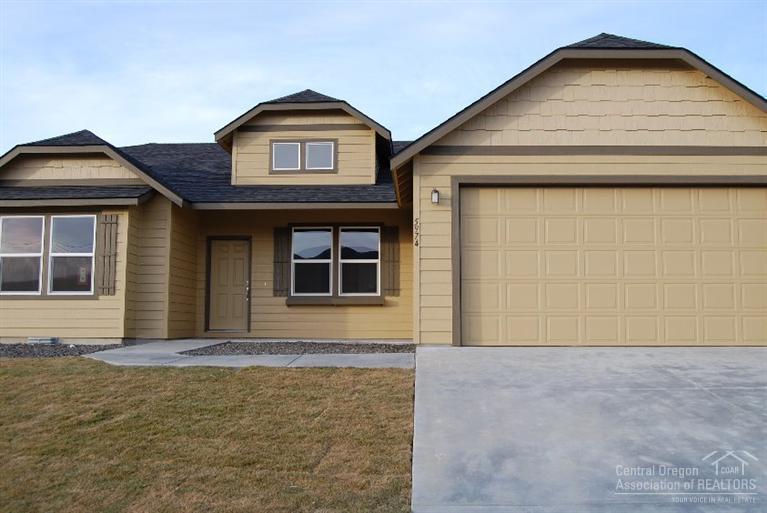 Hayden Homes Pinnacle community in Redmond offering upgrades throughout & Spectacular Mt. Views! Popular Snowbrush plan with slab quartz counter tops in the kitchen and bath, tile flooring in the baths, engineered hardwood in the kitchen/dining, & Cafe' stainless appliances with gas range and refrigerator, under cabinet lighting. Large master suite with walk in closet, stand up tile shower and soaking tub. Craftsman trim with wood wrapped windows throughout.