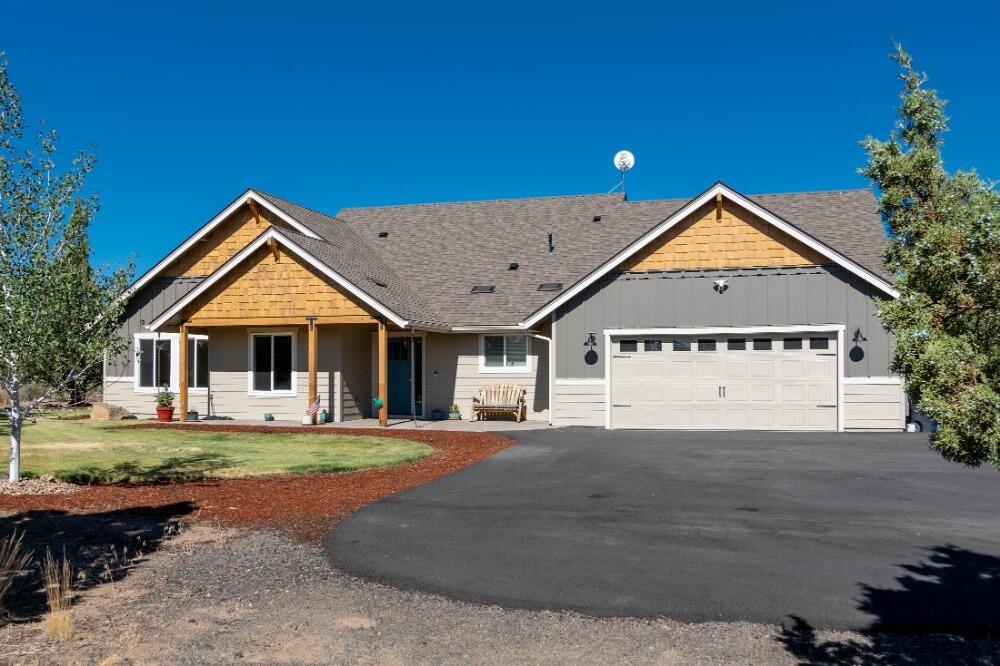 Beautiful newly remodeled craftsman style home on nearly 9 acres. Open floor plan with vaulted ceilings, custom barn door in entry with new quartz countertops, custom lighting, new LVP flooring in great room and kitchen, new tile flooring in laundry and all baths. The primary suite offers a full wrapped tile shower with dual shower heads and access to the hot tub located on the back patio. Newly installed Kinetico water conditioner & reverse osmosis for drinking. House has all new window coverings throughout.

Enjoy the cascade mountain sunsets from your outdoor paver patio or while enjoying a cool evening by the fire pit. 

This property also offers a large 48x30 shop for your RV's and toys. 

Situated just minutes from Costco, this peaceful, newly remodeled home wont last long.

Professional photos coming soon.