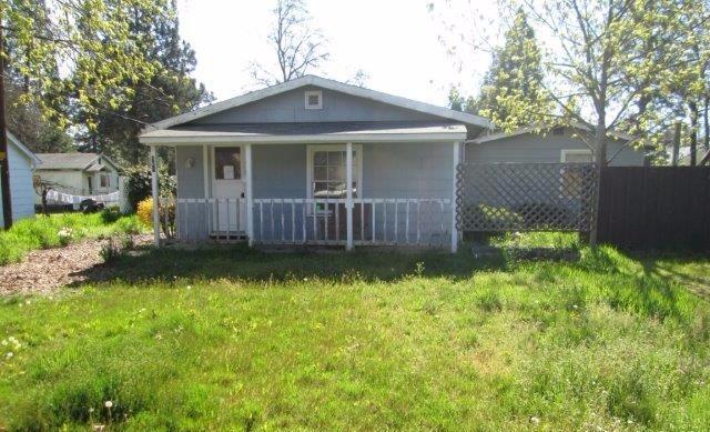 Large two-bedroom, 1 bath home on huge lot (almost 0.25 acres!) in Phoenix. Cute front porch, big yard, mature trees, shed in the backyard, and indoor washer and dryer hookups. It's a fixer, but with some TLC, this could be a great home!!!