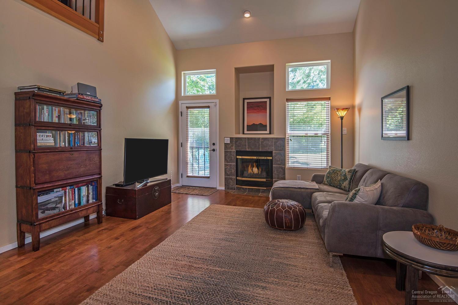 Original model home with over $50,000 in upgrades. Fresh interior paint, loft has all upgraded railing. Remodeled kitchen. Remodeled baths. Newer counter tops and hardware. Beautiful flooring. Epoxy floor in garage. One of the nicest units in Boulder Brook.