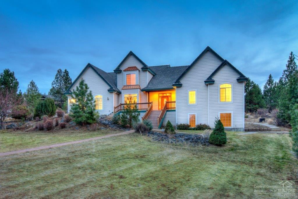 Enjoy living on Bend's westside in desirable Mountain Gate on almost an acre of land. Traditional style home with open floor plan. Master on main, formal dining room, built-in entertainment center, and breakfast nook. 4 bedroom, 2 full bath, and 2 half bath. Large triple attached garage with plenty of room for all your toys. Don't miss the 400 sq ft partially finished basement. Perfect to be used as an office, storage, or an art studio. Don't miss this great opportunity!