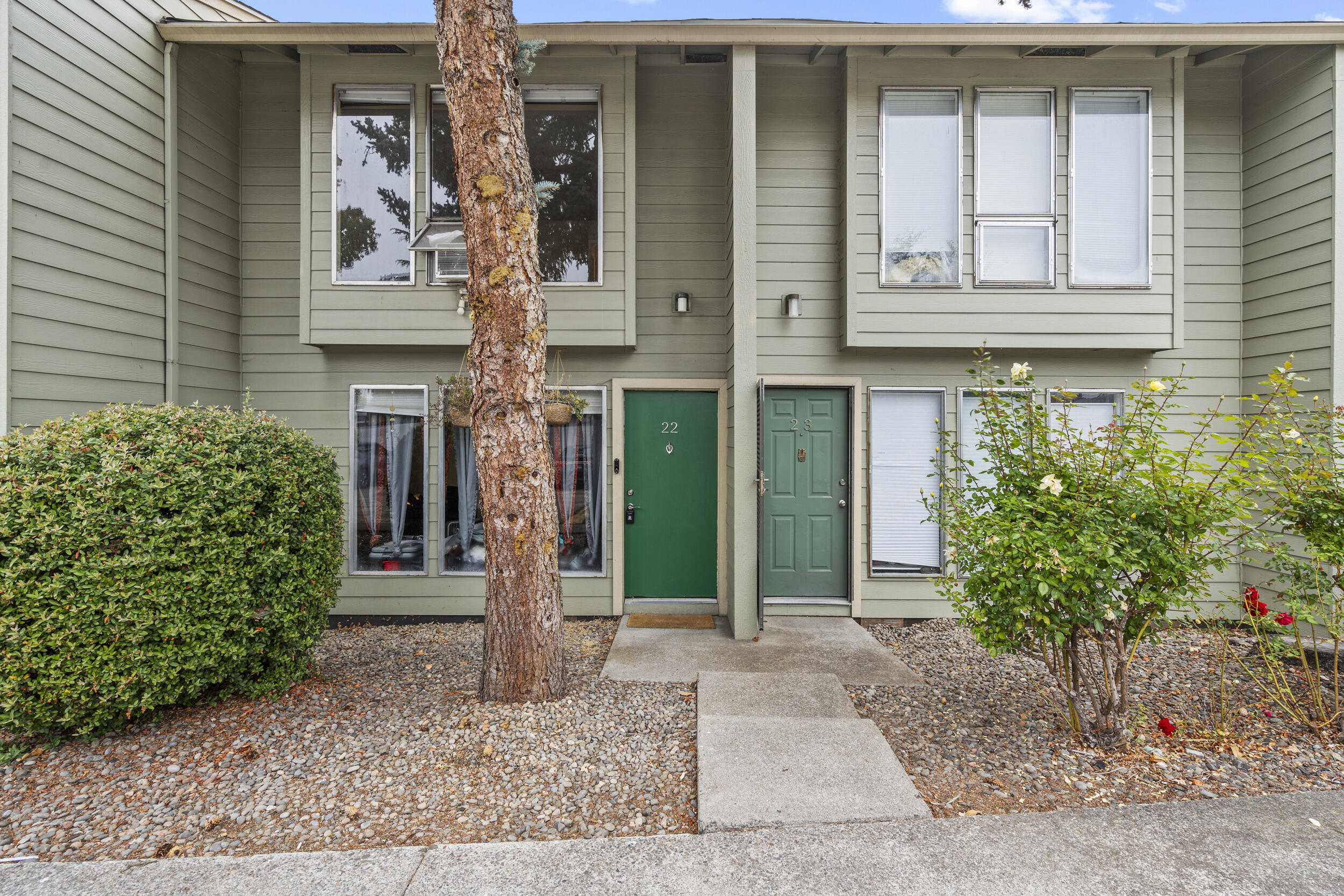Charming Move-In Ready Townhome in Coronado Village! This townhome perfectly blends comfort and convenience. The main level features beautiful flooring throughout. The spacious living room and dining area are bathed in natural light and open up through elegant French doors to a private, fenced backyard, making it ideal for outdoor relaxation or entertaining. The modern kitchen has great cupboard space and the half bath and laundry space add to the functionality of this inviting home. Upstairs, you'll find a bright and airy primary bedroom with large windows, along with a second cozy bedroom and a full bathroom, making this layout perfect for families or guests. Enjoy the community pool for those warm days and take advantage of the fantastic location, just minutes from delightful restaurants, shopping, picturesque parks, wineries, and the Rogue Valley Country Club.