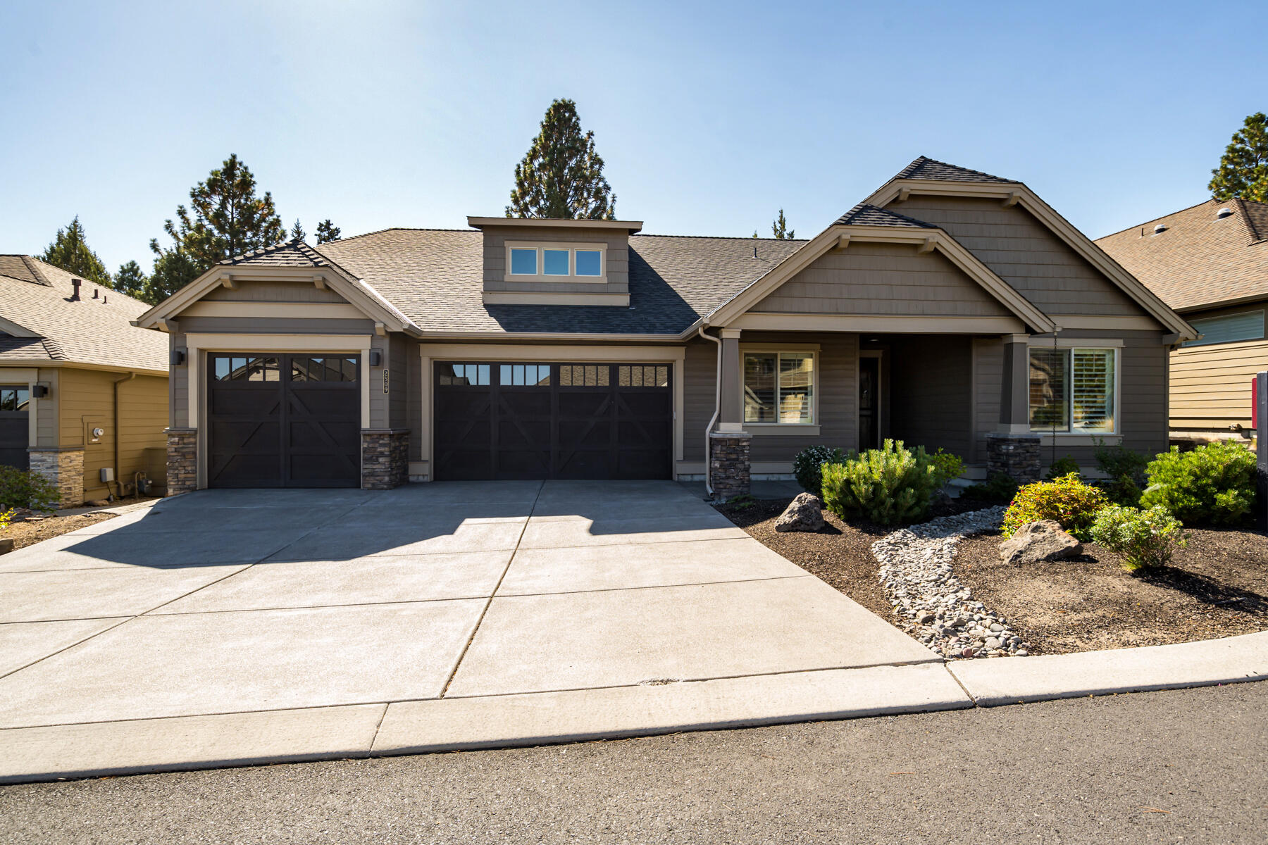 Nestled on Rivers Edge Golf Course on the 18th tee, you will find this beautifully maintained home that's ready for you!  The Mountainside plan built by Pahlisch Homes is a 2,397 +/- sq ft, single level home featuring a dedicated office, junior suite with private bath, guest bedroom and full guest bath with a Kohler step-in jetted soaking tub. There is a spacious primary bedroom with ensuite, and a warm and inviting great room. The great room features a double coffered ceiling, gas stacked-stone fireplace and custom built-ins. The chef's kitchen boasts stainless appliances, double oven, pantry, and a large center island/breakfast bar for entertaining. You will love the 3-car garage with epoxy floor, built-in cabinetry, and work bench. Relax outside under the covered patio looking onto the golf course and pine trees. Additional features include Hunter Douglas plantation shutters throughout, tankless water heater, drip irrigation and close access to shopping and downtown!