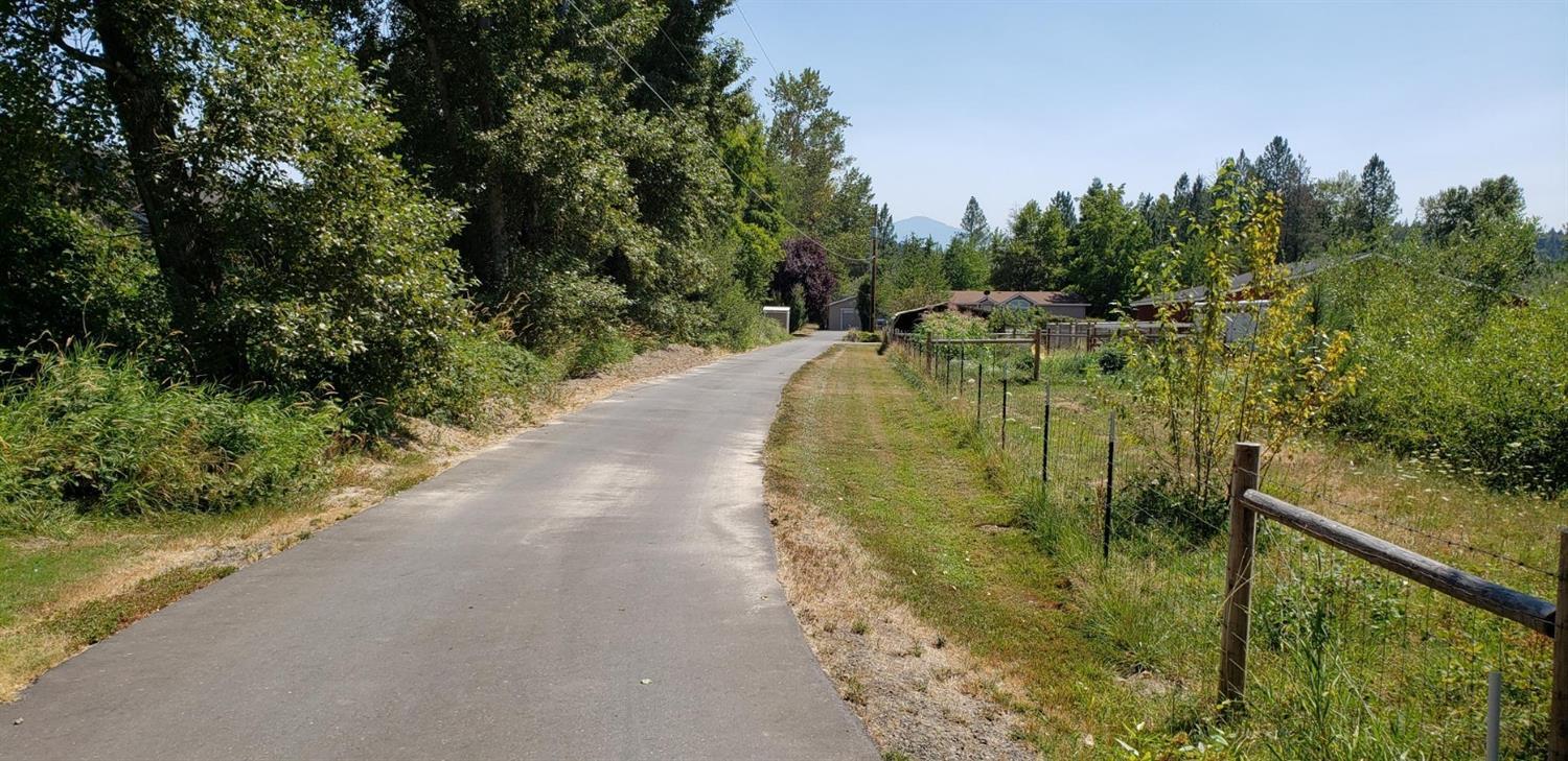 Nice home on a little piece of Oregon with this 3 bed, 2 bath double wide manufactured home on 1.14 irrigated acres in the Redwood area. Far enough out to avoid the hustle and bustle, but close enough to be convenient. Pleanty of room for a good garden and raising some critters if you'd like.