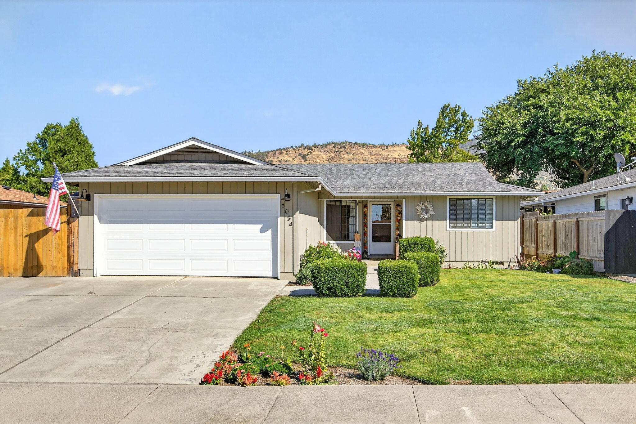 Welcome to this beautifully maintained 4-bedroom, 2-bath home in the heart of East Medford. Thoughtfully designed with both a living room and a spacious bonus room/great room filled with natural light. This home offers plenty of space for gathering and entertaining. The recently landscaped backyard provides a private retreat, perfect for outdoor enjoyment. Nestled in a quiet cul-de-sac, you'll love the convenience of being close to schools, local restaurants, and everyday amenities. Recent updates include a newer roof (2022) and durable luxury vinyl plank flooring throughout, making this home as practical as it is stylish. Don't miss the opportunity to own this rare 4-bedroom home in one of East Medford's most desirable areas—schedule your showing today before it's gone!