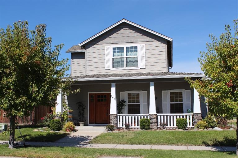 This lovely 1765sqft Craftsman-style home is a must see! Located in a sweet neighborhood it boasts a spacious living area with 9ft ceilings on the first level. The bright and open kitchen has newer appliances, lots of counter space, and a breakfast bar; a great space for entertaining! The master bedroom is located on the main level, complete with dual sinks in the master bathroom. The second level hosts two additional bedrooms and a full bath. Professionally landscaped with automatic sprinkler system and an over-sized, detached, two-car garage.