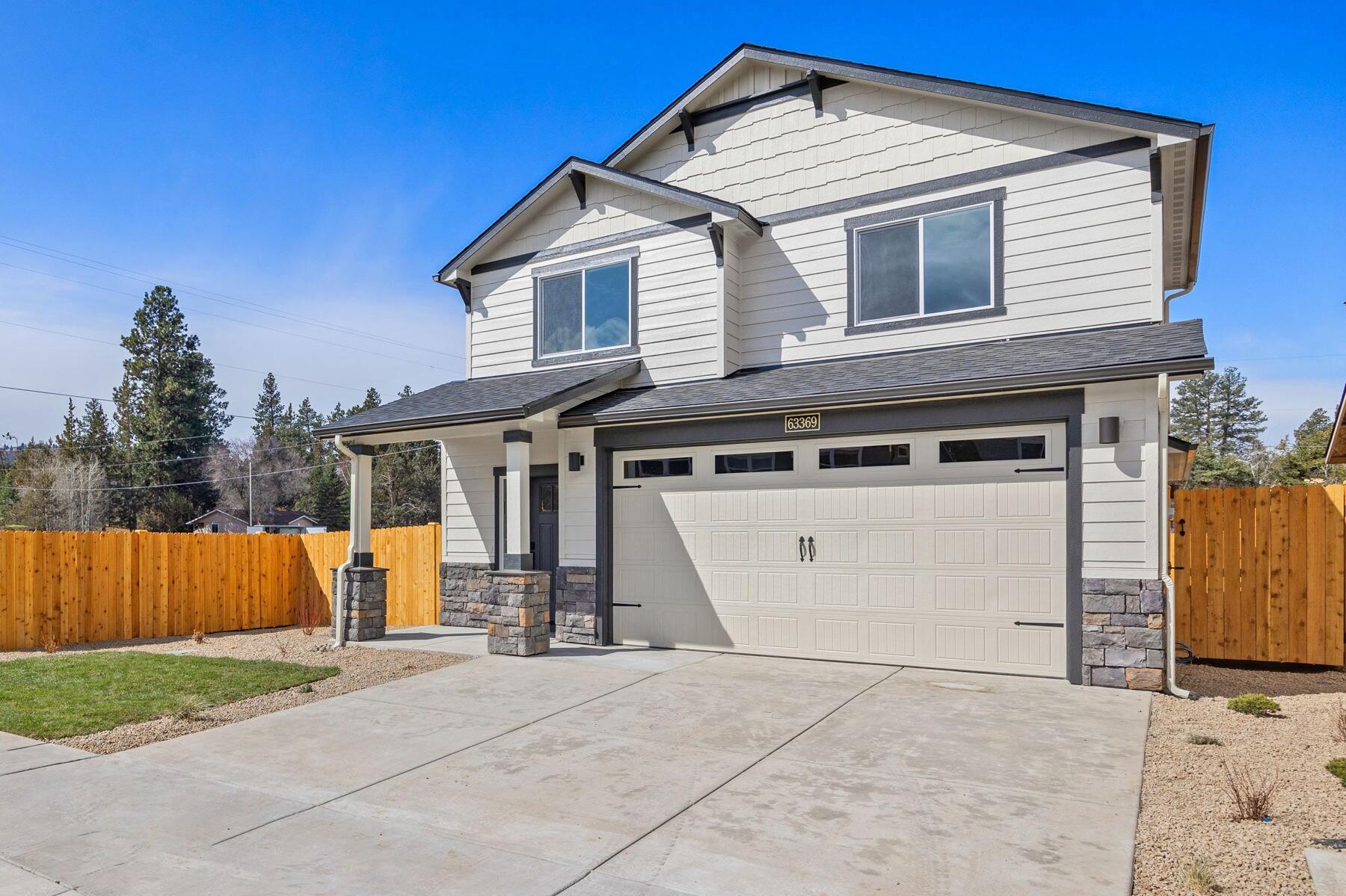 SAVE $25K ON FINAL HOME IN GLEN VISTA! MOVE IN READY! Photos of actual home.
Glen Vista is situated just half a mile from Riley Ranch Nature Reserve in beautiful NW Bend! A close drive to hwy 97, and the Cascade Village Shopping Center for all of your shopping needs. The 1573 square foot Harrison is an intelligently designed two-story home that lives larger than most mid-sized plans. The first floor is home to a spacious main suite with walk-in closet and dual vanity ensuite. The open living room is adjoined by the dining room and kitchen, which boasts ample counter space and cupboard storage. Near the entry is a convenient powder room for guests. Upstairs, two sizeable bedrooms offer large closets and share the second full bathroom. Fully fenced with front and backyard landscaping included. Large yard space with a covered patio for backyard entertaining! Laminate flooring, painted cabinets, tile shower, A/C, quartz countertops and a 4 foot garage extension included.