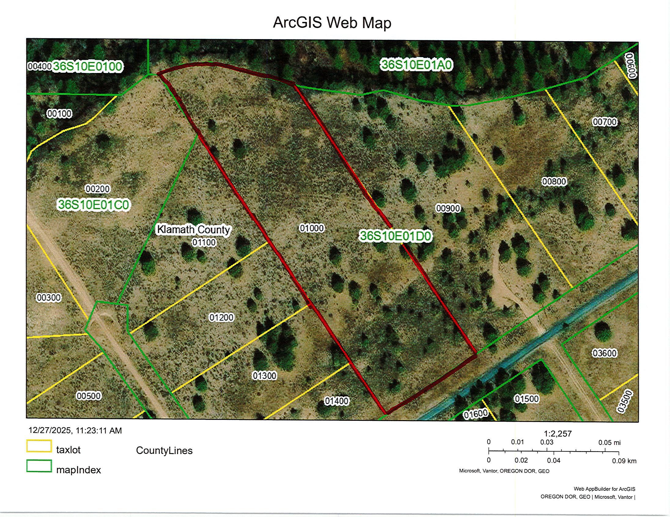 Wow! Almost 5 acres with power at the road and an amazing view off the back of the property! Zoned R2 and manufactured homes are allowed. This is Tableland Road which is the main western access road to Tableland.  Lot is flat and usable with a scattering of a few trees. Lots of sunshine here and you can see forever!