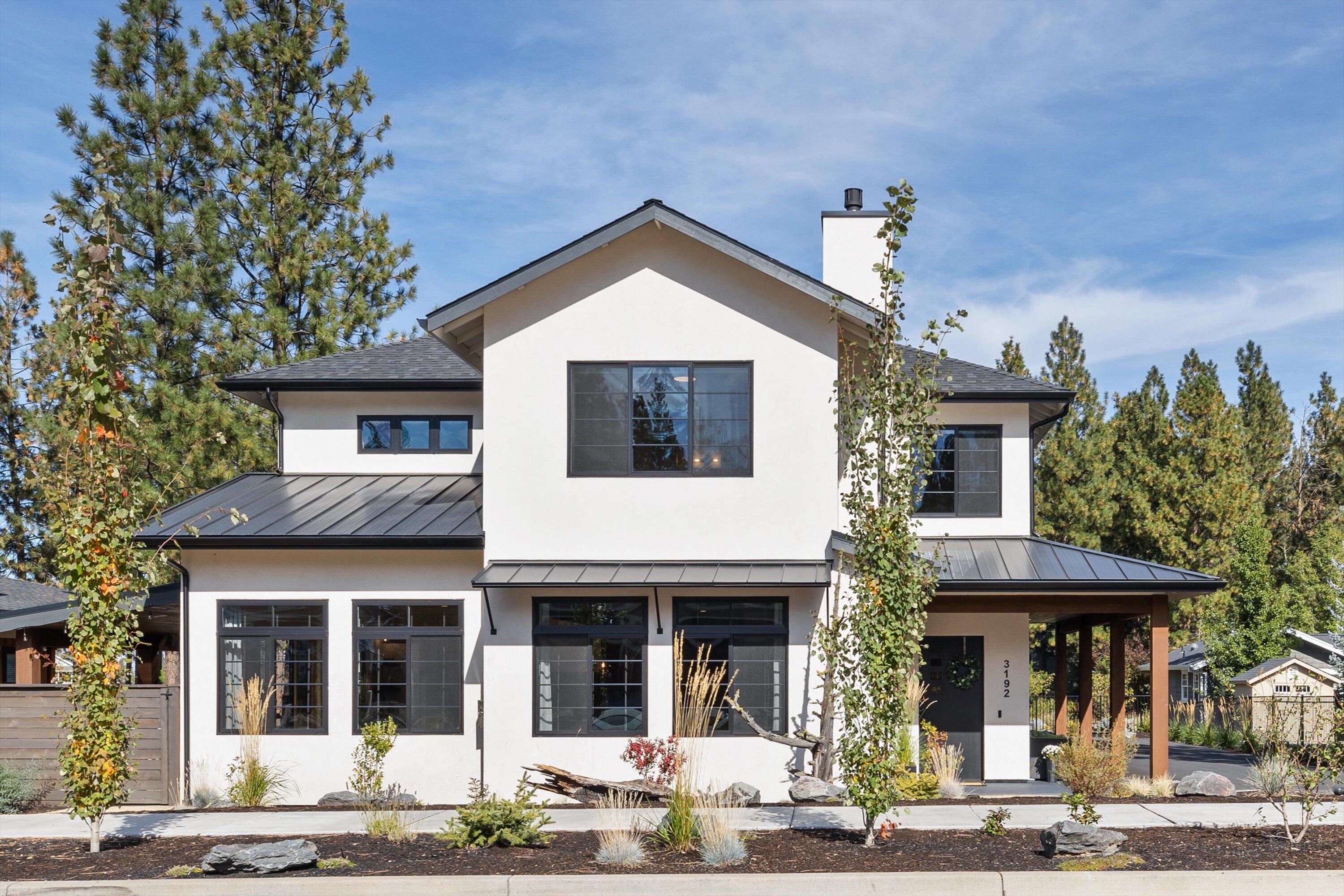 Incredible gem of a property on Bend's desirable Westside near Shevlin Park. This custom builder's own home offers 5 bedrooms, 5 1/2 baths, + bonus AND private office. The thoughtful design includes primary on main with 4 bedrooms up (3 w/ en-suites) ensuring privacy for all. A separate home-office off the garage with outdoor access and in-floor heating is perfect for your remote work space. The main living features an open concept with an abundance of natural light, hydronic in-floor heating, and engineered hardwoods throughout. The chef's kitchen features quartz countertops and butler's pantry. Direct access from the main living area to the covered patio for seamless indoor/outdoor flow. 4-car heated garage includes an extended bay and EV chargers. Nestled on an easy-to-maintain .24-acre level lot with low maintenance landscaping, hot tub, fire-pit and garden. This home is minutes from Parks, Schools & Trails - Luxury, Comfort, and Location in one!