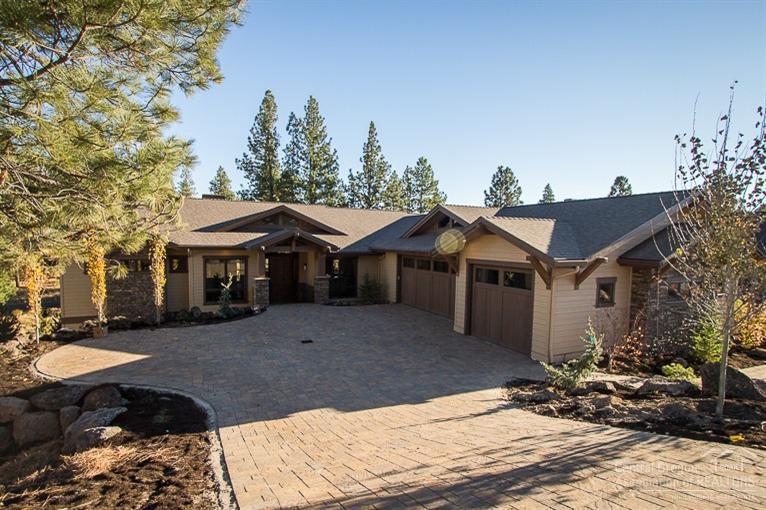 Incredible, spacious custom home in The Reserve at Broken Top. Immersed in luxury finishes and the latest amenities, this home features solid surface counters and vanities, beautiful hard-wood floors, wood cased windows and solid wood doors. Chef's kitchen includes 6 burner double oven range and massive granite countered island with farm style sink, custom cabinetry, built-in wine fridge and espresso machine. Driveway and covered deck and patio are finished with pavers. Full Sonos surround sound.