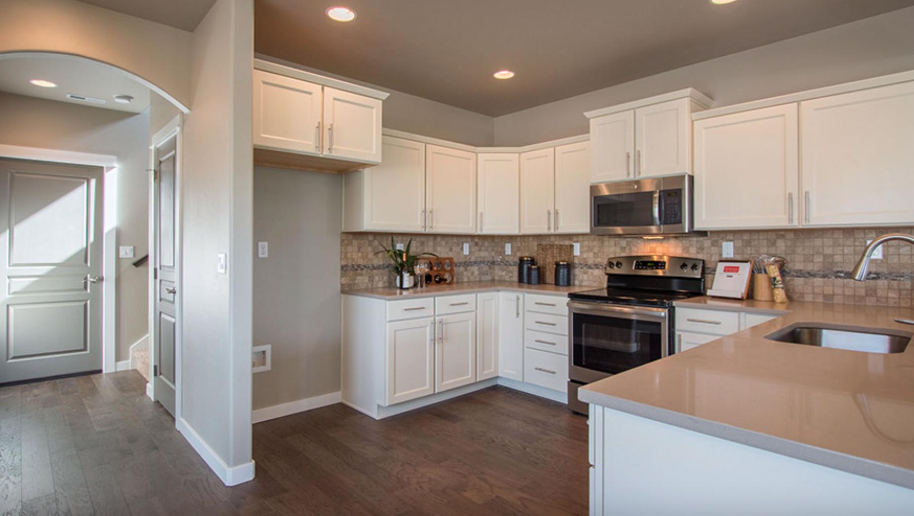 The 1787 square foot Metolius is an intelligently designed two-story plan that lives larger than most mid-sized plans. The first floor is open throughout the family and dining room and into the kitchen where there is plenty of counter space and cupboard storage. The alley-accessed garage gives this home tremendous street appeal. Upstairs, the versatile loft area can be converted to a fourth bedroom or den. The expansive master suite features a dual vanity bathroom and large closet. Rounding out this popular floor plan are two spacious bedrooms with large closets that share a second full bath.