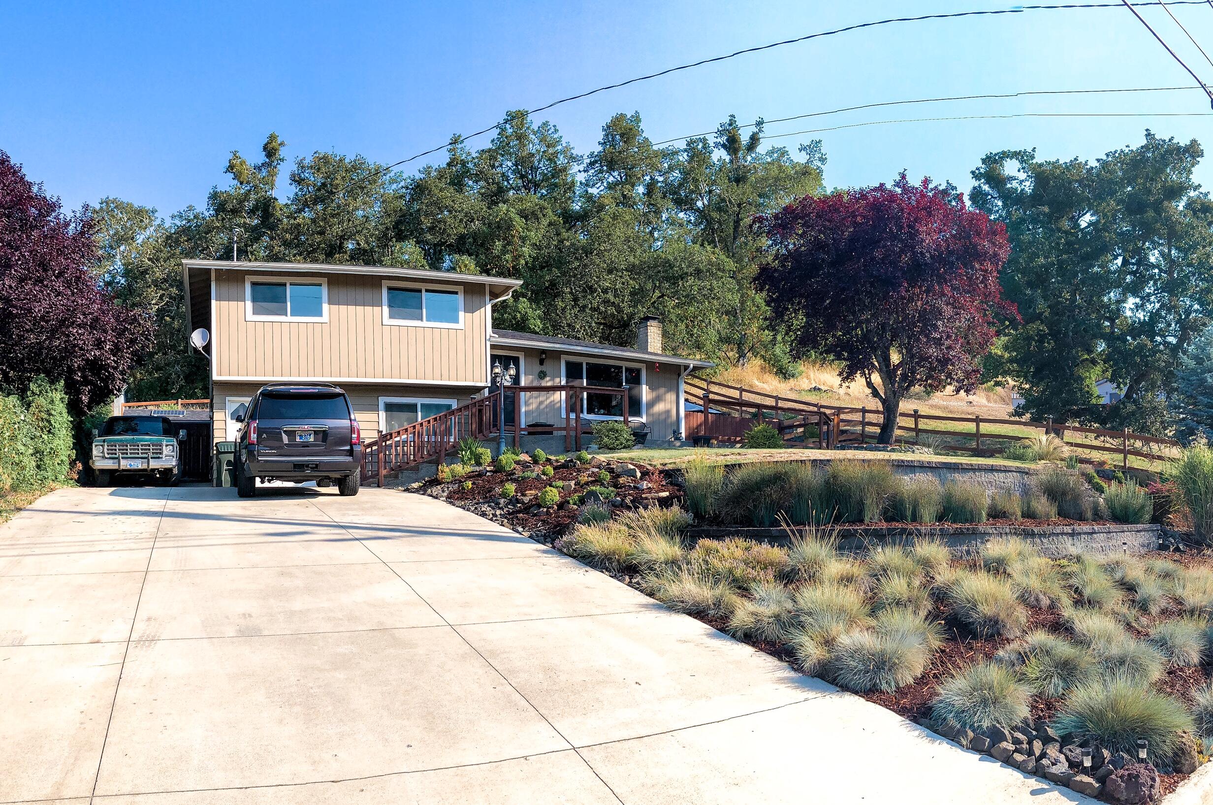 This Gem feels has the country atmosphere and living, we all want, yet its just minutes to all city conveniences!!. Costco, Lowes, Home Depot, schools and medical within minutes. Newly updated kitchen, bathrooms, windows, flooring, cabinets and granite counters. Newly landscaped. Large front and back concrete patio's for your outdoor enjoyment. Large concrete driveway with extra parking. Great views of the valley. This is a must see!! Shows pride of Ownership
