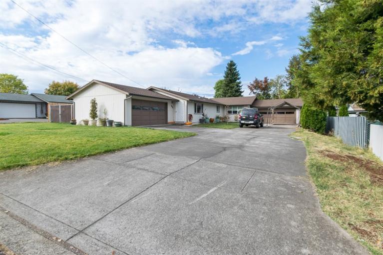 Looking for a great investment in East Medford that you could buy and live in one and rent the other? Or maybe need a two family set up? You've found it! This duplex opportunity allows you to live in one side that has been recently updated with granite counter tops and new floors with 2 bedrooms and one full bath. The other unit features 3 bedrooms and 1 bathroom. Both units include single level living, two car garages, newer windows, insulation, hot water heater, new furnace and 8 year old roof.