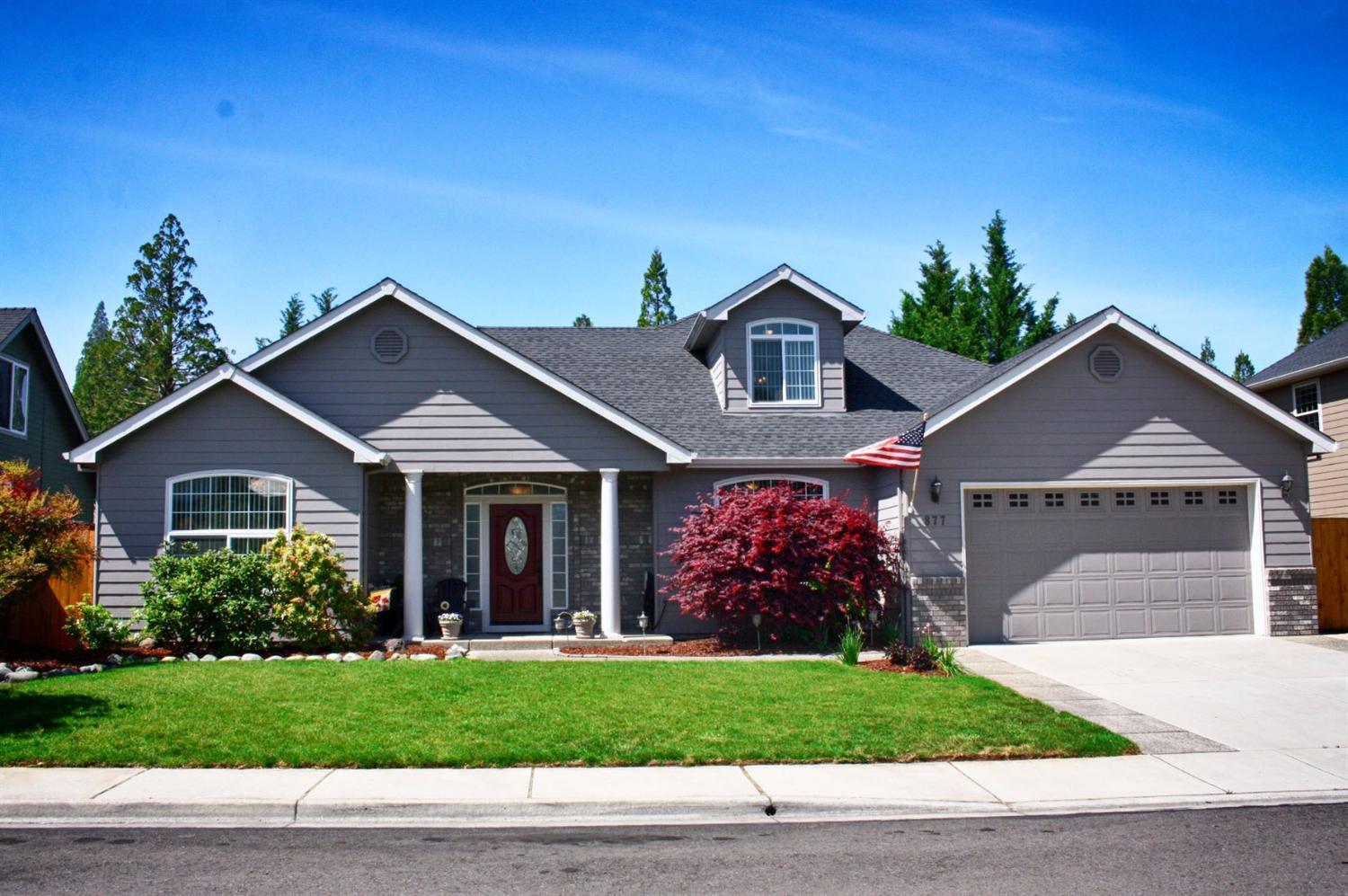 Absolutely immaculate Central Point home perfect for entertaining with large open floor plan, huge private yard with swimming pool, and a fresh rural feel. This newer home includes soaring ceilings, wood floors, a covered outdoor patio, large updated kitchen with bar seating, and an inviting bright living room with gas fireplace. The home boasts over 2,400 square feet and includes 4 bedrooms 2 baths with all the living space on the main level and a bonus room upstairs. All carpet and vinyl has been replaced as of this year. This is a well-kept one owner home in a very desirable central point neighborhood, in a great school district.