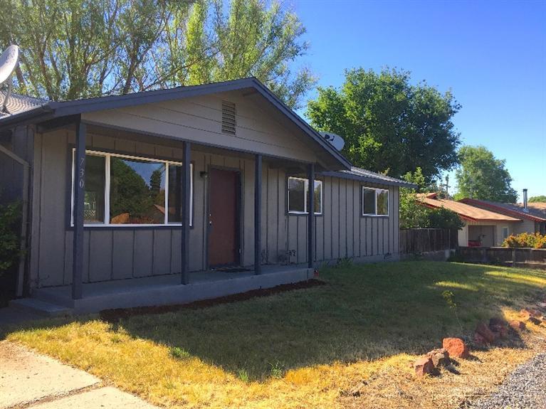 Wonderful starter home! This is a charming 3 bedroom, 1 bath Ranch Style home. Located on a quiet street close to shopping and amenities of down town. Newly updated with new windows, paint & wall heating. The home sits on a larger lot with a fenced yard, single attached garage and RV parking.