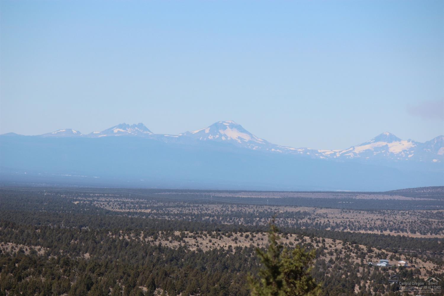 Beautiful lot just under 2 acres. Property has gorgeous views of the Cascades and surrounding mountains with stunning sunsets. This is quiet and peaceful with abundant wildlife. Mostly a paved road to the property with very little gravel. Power is at the road. This property backs directly into over 5,400 acres of BLM land! Would be great for either a permanent or vacation home.