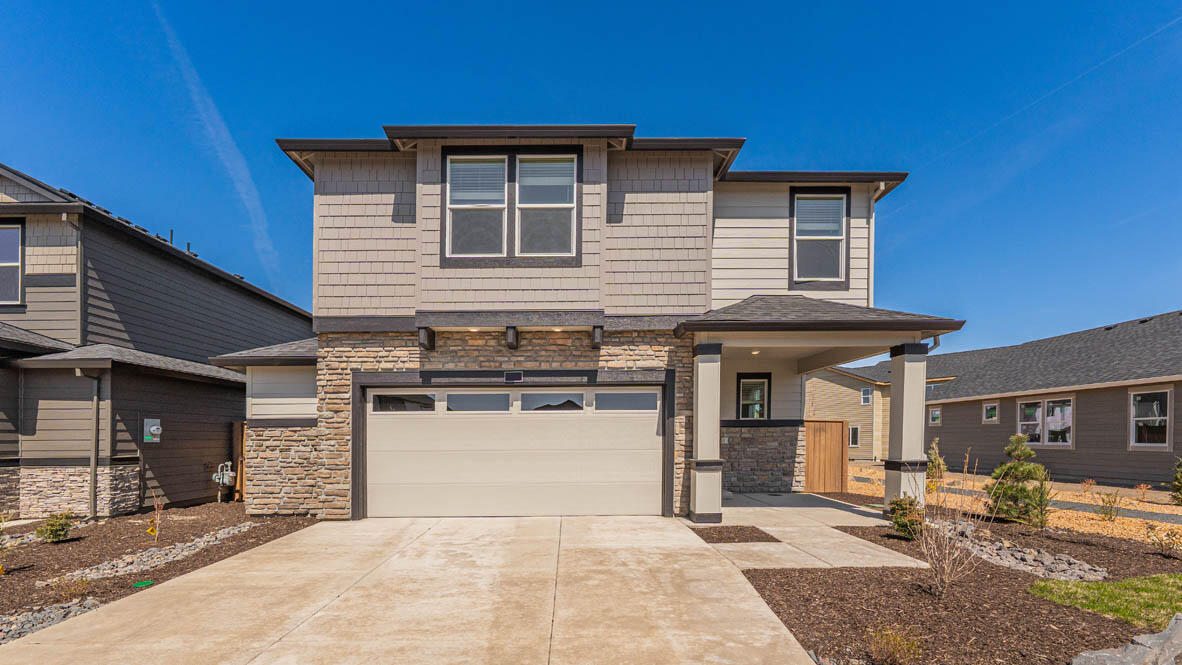 SPECIAL RATE and closing cost incentive with use of builder's preferred lender! Experience Stevens Ranch situated near Reed Market Rd and Highway 20 with easy access to the outdoors and city amenities. This roomy Pacific two-story floor plan has 4 bedrooms plus a large bonus room, 2.5 bathrooms, with a den on the main floor that is perfect for guest stays or an at-home office. The open concept living space has luxury vinyl plank flooring and designer touches including a fireplace. The chef-inspired kitchen features upgraded stainless-steel appliances, quartz countertops with full height backsplash, under cabinet lighting, soft close cabinets and full extension drawers. The primary bedroom ensuite features a double vanity sink, walk-in tiled shower, and a spacious walk-in closet. Sales office hours are 10am - 5:30pm daily. Photos are representative of plan, features/specs may vary.