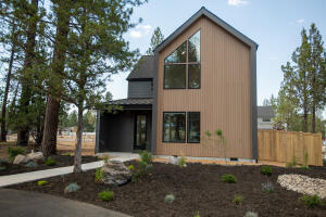 Sunset Meadows - the much anticipated new development in the charming town of Sisters, Oregon - has begun selling Phase 2! Built by Award Winning Builder Woodhill Homes.The Contemporary Modern Chalet design of the homes give the neighborhood the look & feel of a mountain resort. Cascade Mountain Range, including the Three Sisters are along McKenzie Highway-directly in front of this property! This home is a single family home just under 2,000 sq.ft. w/ 3 bedrooms & 2 1/2 baths.The main floor is an all open floorplan w/large windows & vaulted ceilings to allow the Central Oregon sunlight to shine through. Primary Bedroom w/ensuite bathroom is on the main floor.Stainless Steel Kitchenaid appliances & solid surfaces in the kitchen & bathrooms-1/2 bath & laundry are downstairs & 2 bedrooms, a full bath & a large loft upstairs. Attached 2 car garage.Your chance to own a brand new home in Sisters & start living the Central Oregon Lifestyle & watch the sun set over the Cascade Mountains.