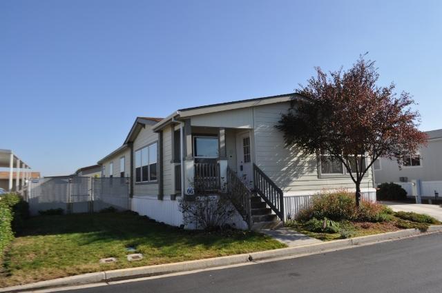 Wow! Great buy!! Owner said sell it now! Custom built home with extras. New with set up costs over $100,000 per seller. Newer all age in park manufactured home in a quiet simi-private location with nice homes. Quality built 2x6 construction by Northwest Home Builders that is energy efficient with heat pump and all vaulted ceilings & sheetrock, nice textured walls, large windows, large kitchen with walk in pantry, nice appliances, formal dining and living rooms. Large master with walk in closet, garden tub and separate shower. Large laundry room with deep sink and great storage. All bedrooms are large and vaulted ceilings. Close to Northgate New Shopping Center & Trader Joes. Minutest to Jacksonville, Medford & Central Point. Large covered parking plus extra parking & storage shed. Fenced backyard with nice landscaping & garden area & new soft sided pool just put up in July!