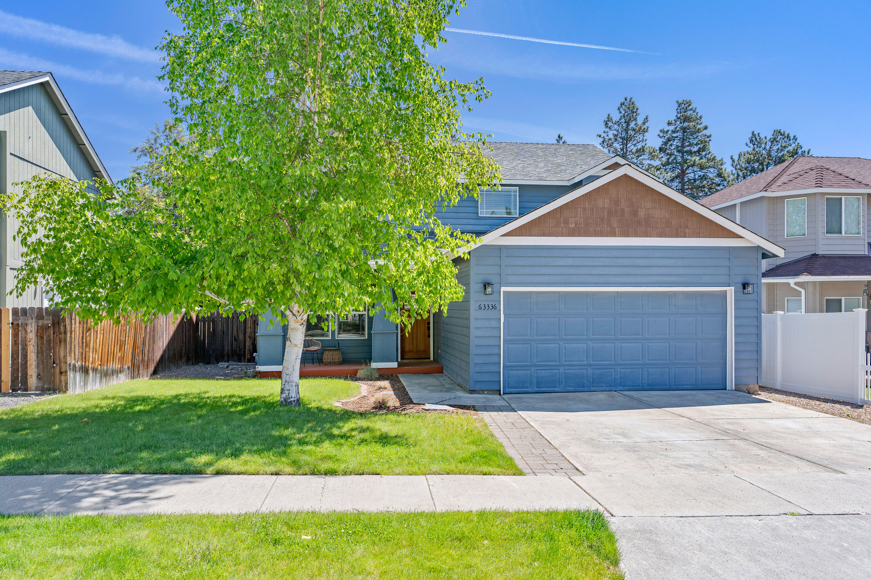 Great opportunity to own your own home or income producing investment property in NW Bend. This completely remodeled home sits on a quiet, tree-lined street with close proximity to Riley Ranch Nature Reserve & Harvest Park/playground. The recent remodel includes interior paint, luxury vinyl flooring downstairs, quartz countertops and new backsplash in kitchen/baths, new stainless-steel appliances, new lighting & hardware throughout. As you enter the home you will find a light-filled room that would be perfect as a den, office, additional living or dining room. The spacious eat in kitchen overlooks the great room with corner fireplace and slider out to the pergola covered & fenced yard (with shed), perfect for entertaining. A powder bath and laundry room complete the downstairs. Upstairs is the Primary Suite and 3 additional bedrooms and another full bath. All of this near shopping, trails, and schools. Make this one your Bend basecamp and start planning your adventures today!