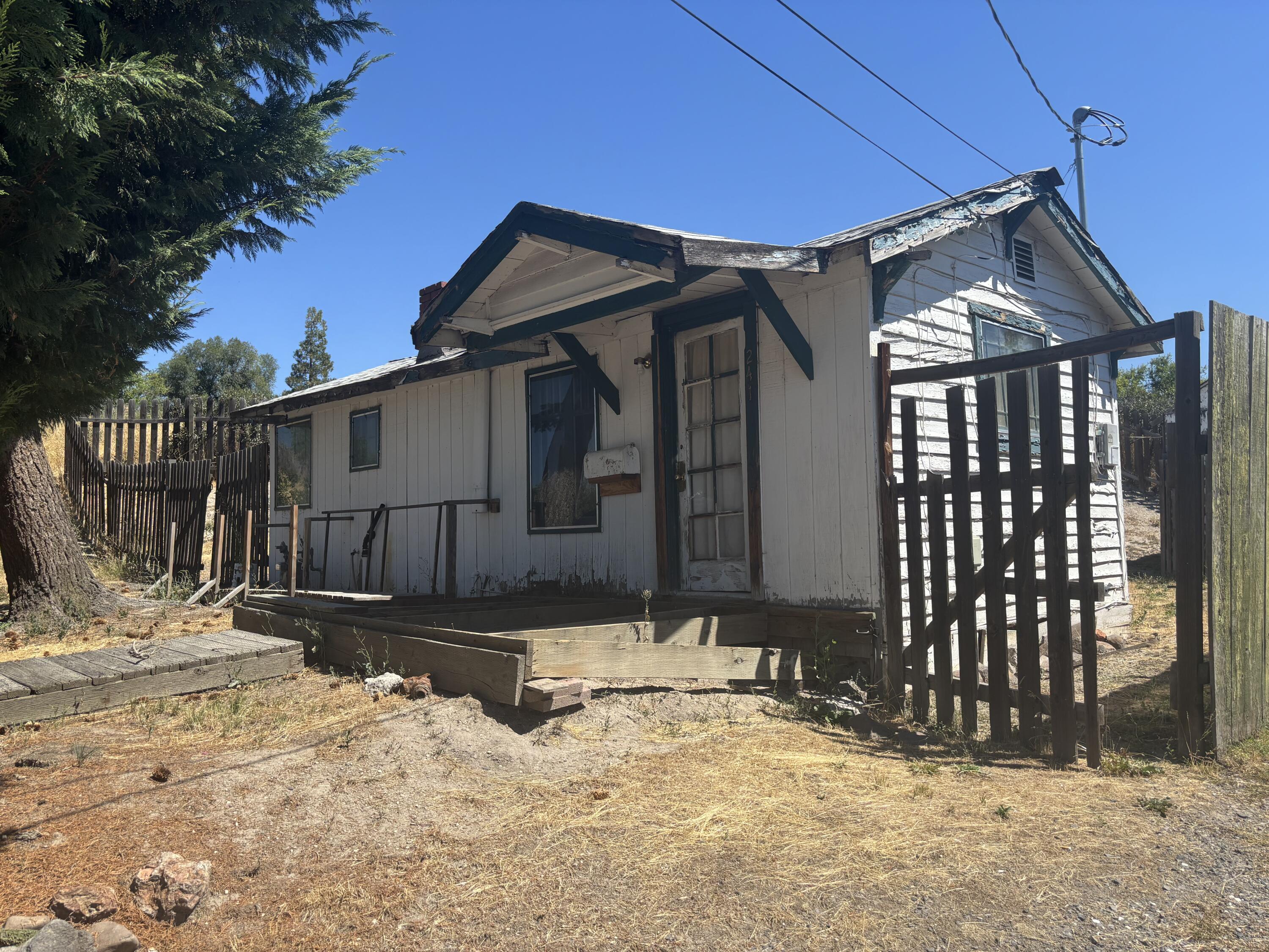 Zoned Apartment. Great affordable 2 bedroom 1 bath home centrally located. Cash or Seller will carry with 20% down.  Loan terms are 7.0% interest amortized over 30 years with a 5 year balloon.  Front deck is missing boards, so do not show during the dark. Seller is licensed  Real Estate Agent.