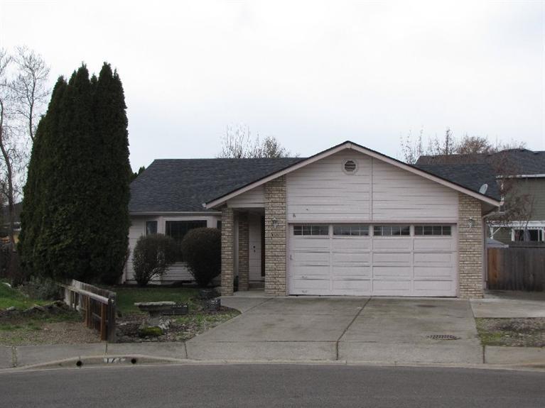 Very nice and well maintained 3 bedroom, 2 full bath home on a large lot. Brand new carpet, tile flooring in kitchen, dining room, hallways, both baths and entry. Roof is only 2-3 years old. Located in a quiet cul-da-sac. Private backyard and large RV Parking.