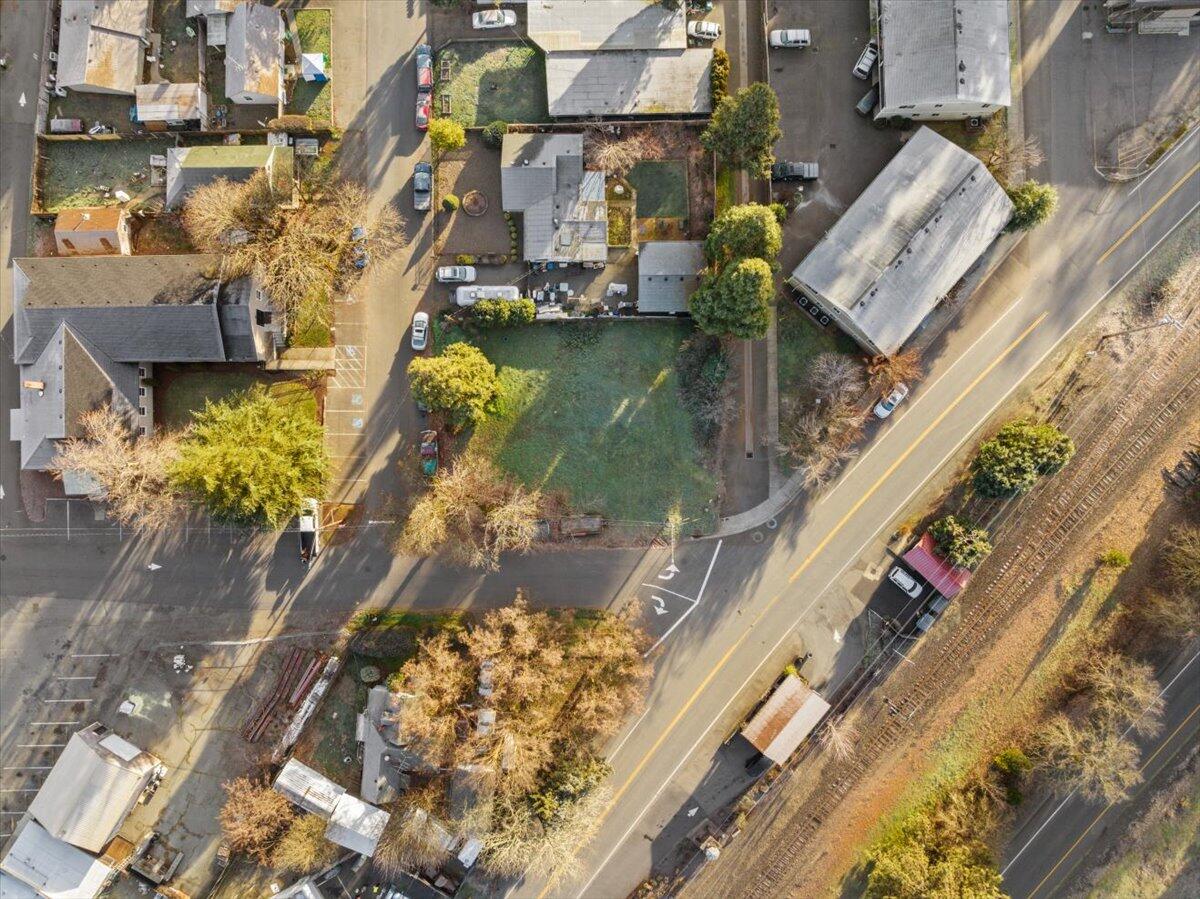Price reduced to Sell- $70K!!!!  Discover the perfect opportunity to launch your new business in the charming city of Rogue River or explore mixed-use potential with the option of a residential or multifamily structure to complement commercial use. . This .17-acre lot, zoned C-1 Commercial, offers flexibility for a range of ventures such as a boutique, café, or coffeehouse, with the added potential to integrate a live/work or income-producing residence. Ideally located for visibility and accessibility, the property benefits from easy I-5 access and a community known for its natural beauty, small-town charm, and steady flow of locals and visitors. Whether you envision a thriving shop, bustling café, or creative multi-use project with residential integration tied to a commercial anchor, this lot provides the canvas