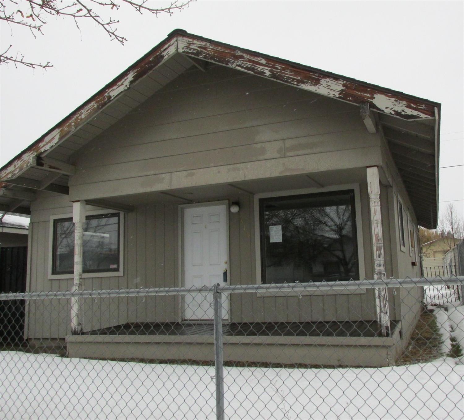 Are you looking for a home plus a huge shop? You have found it! This home comes with a huge 3868 sq. ft. shop with concrete floor. The 2 bedroom 1 bath home has geothermal heat. Fenced yard and a deck in the back. Interior has hardwood and tile floor. Updated kitchen cabinets and counter tops. Come and see this one today! This is a Homepath property.