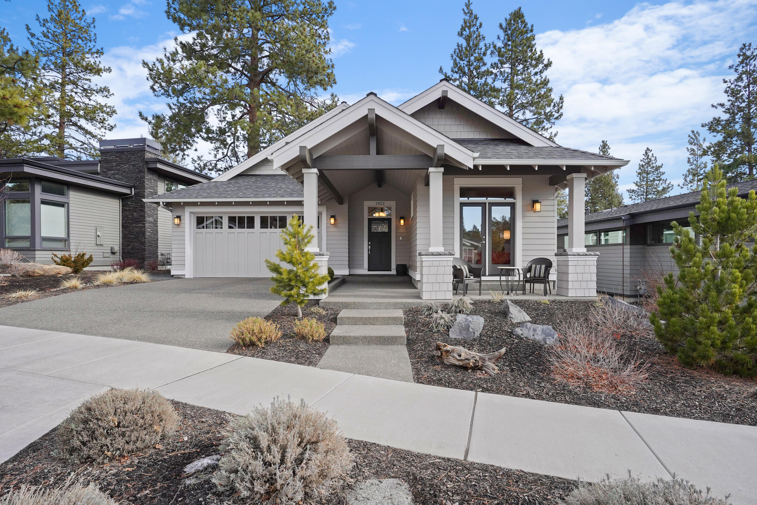 This single level Northwest Craftsman style home sits in the heart of Northwest Crossing near Discovery Park and combines a fabulous floorplan with high-end finishes.
The bright and open main living area features a vaulted ceiling in the great room, beautiful hardwood floors along with a gas fireplace and custom built ins. The Primary
suite features vaulted ceilings and boasts an impressive, Primary bath with quartz counters, tile floor, tile shower and walk-in closet. One of the two guest bedrooms has
its own outdoor access. Fully landscaped, fully fenced yard. This neighborhood was thoughtfully designed to provide residents with conveniences like restaurants, shops, parks, schools and trails. Pedestrian-friendly streetscapes and patios invite neighbors out of their homes.