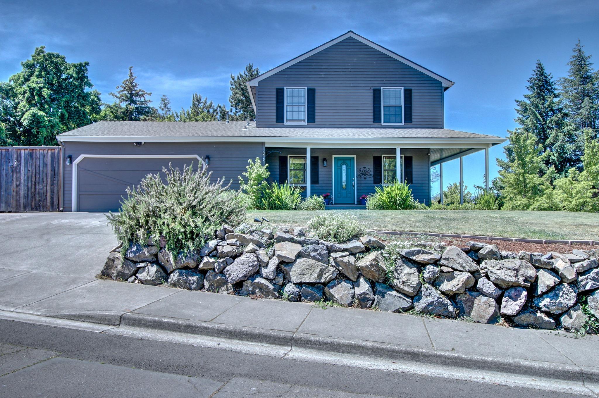 Hello Summer! Location, Curb Appeal, Huge Corner Lot, Great East Medford Neighborhood -Welcome to 2924 Pennington Drive, Cool off in the sparkling inground pool complete w/ slide, Tiki Bar, & backyard PRIVACY. This two-story home features gorgeous mountain views from a delightful wrap around porch, a light & bright kitchen w/ Stainless Appliances, Gas cooktop, Breakfast bar, Pantry, & large open Dining area. Off the kitchen is a generous size laundry area with tons of storage. The main floor Living room offers a wall of built-ins -perfect for family photos, a gas fireplace with mantel and classic brick surround. Head upstairs to 3 nice size bedrooms, a fabulous built-in reading bench, & a gorgeous updated bathroom.. If that's not enough, step Outside to a Spectacular Entertainment area- complete w/ Covered Patio, Fire Pit area, Built-in BBQ, separate fenced area w[shed (perfect for family pets- or play area) & gated RV area for all your Toys!! Plus 2 car garage w/built-in storage!