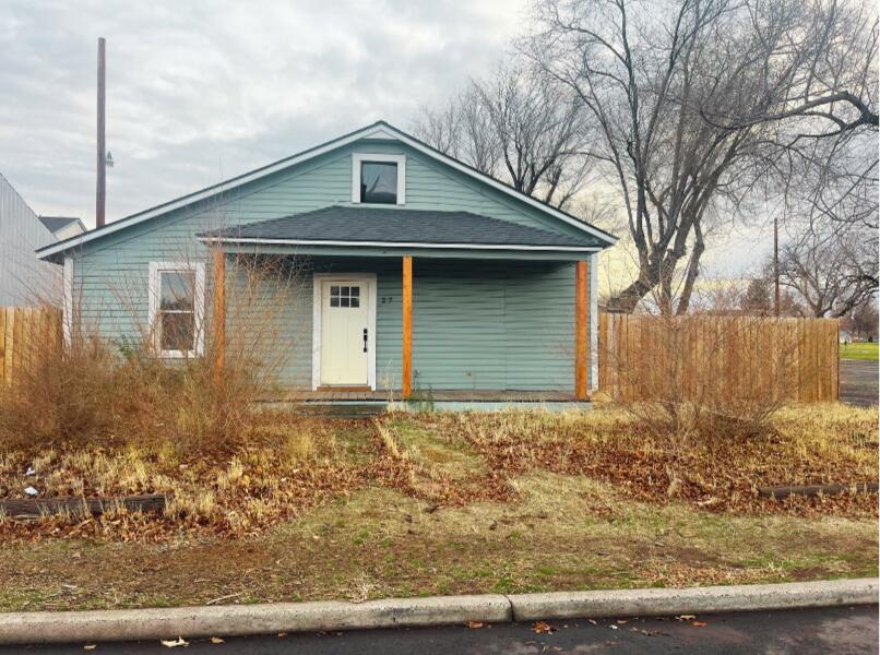 Rare opportunity for Residential or Commercial space in prime location. Zoned C2. Home has two bedrooms and one full bathroom. Newer Carpet. Recent Kitchen upgrade with butcher block countertops and new cabinets. Electrical panel has been updated as well.  Outside has two separate fenced yards with gates. Schedule a showing to see all this home has to offer.