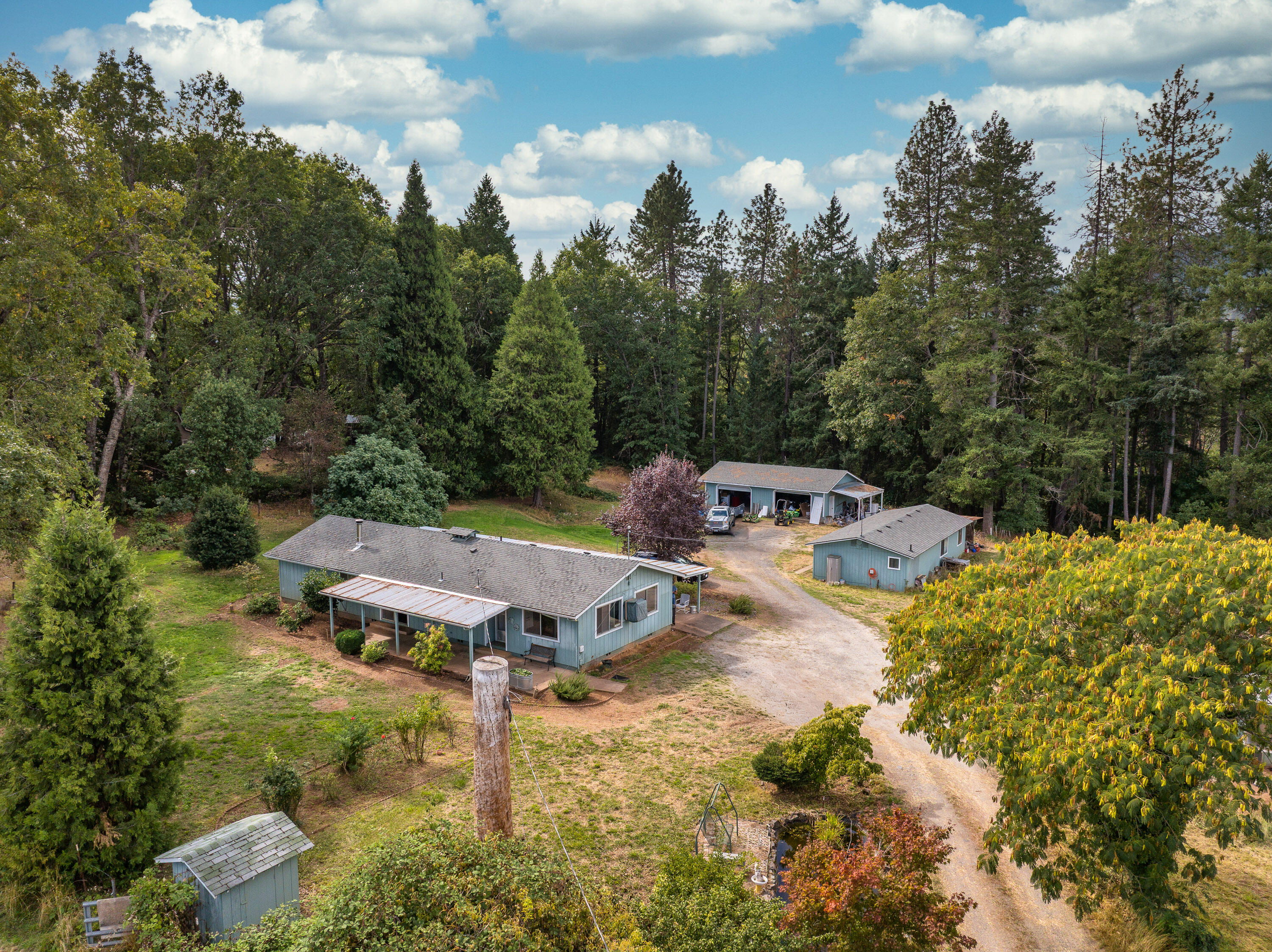 Bring your animals and your vision to this country property in the desirable Jerome Prairie area! Set on 3.65 irrigated acres, 2424 Robinson Rd offers a 2-bedroom, 2-bath, 1,536 sq ft home along with a detached 4-car garage built in 2011. A 960 sq ft general-purpose building provides endless potential—including possible ADU use (buyer due diligence). The property is fully fenced and cross-fenced with a metal lean-to for livestock, a chicken coop, and established fruit trees. Enjoy the KOI pond in the front yard and room to create your ideal homestead. With pasture, outbuildings, and plenty of space, this property is ready for your rural lifestyle dreams!