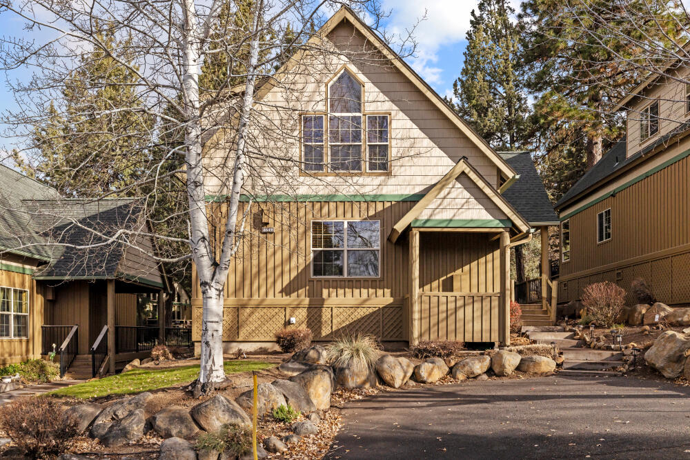 Beautifully maintained 2-bedroom, 2-bathroom chalet located in the desirable Running Y Ranch Resort. Both bedrooms are spacious serving as primary suites, perfect for guests or an in-law setup. The upstairs suite features a walk-in closet, an enclosed bathroom, and abundant natural light. The open concept living area boasts vaulted ceilings, upgraded carpet, wooden blinds, and a fully equipped kitchen with stainless steel appliances. A separate laundry room offers cabinetry and a full-size washer and dryer. This home is being sold fully furnished and currently set up as a successful vacation rental, complete with a fully stocked kitchen and comfortable furnishings. Step outside to the inviting deck and all the amenities the resort has to offer, including outdoor trails, indoor swimming pool, tennis and pickleball courts, fitness center, playground, and less than a 5-minute drive to one of Arnold Palmer's ''Sweet Sixteen'' golf courses. Clear pest and dry rot report on file